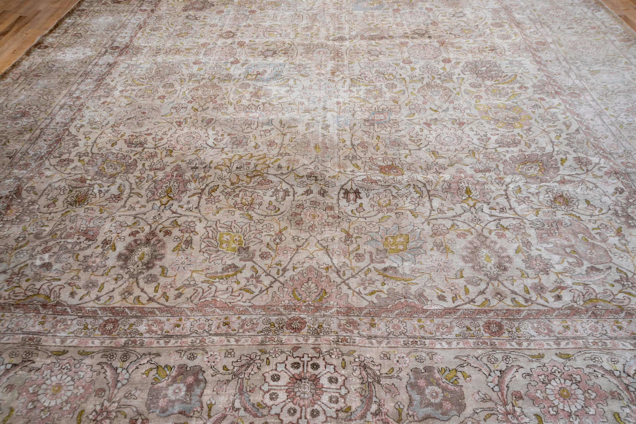13' x 17' one-of-a-kind handmade antique Tabriz oversize rug. Color palette: ivory, taupe, blush, beige, gold, pale blue