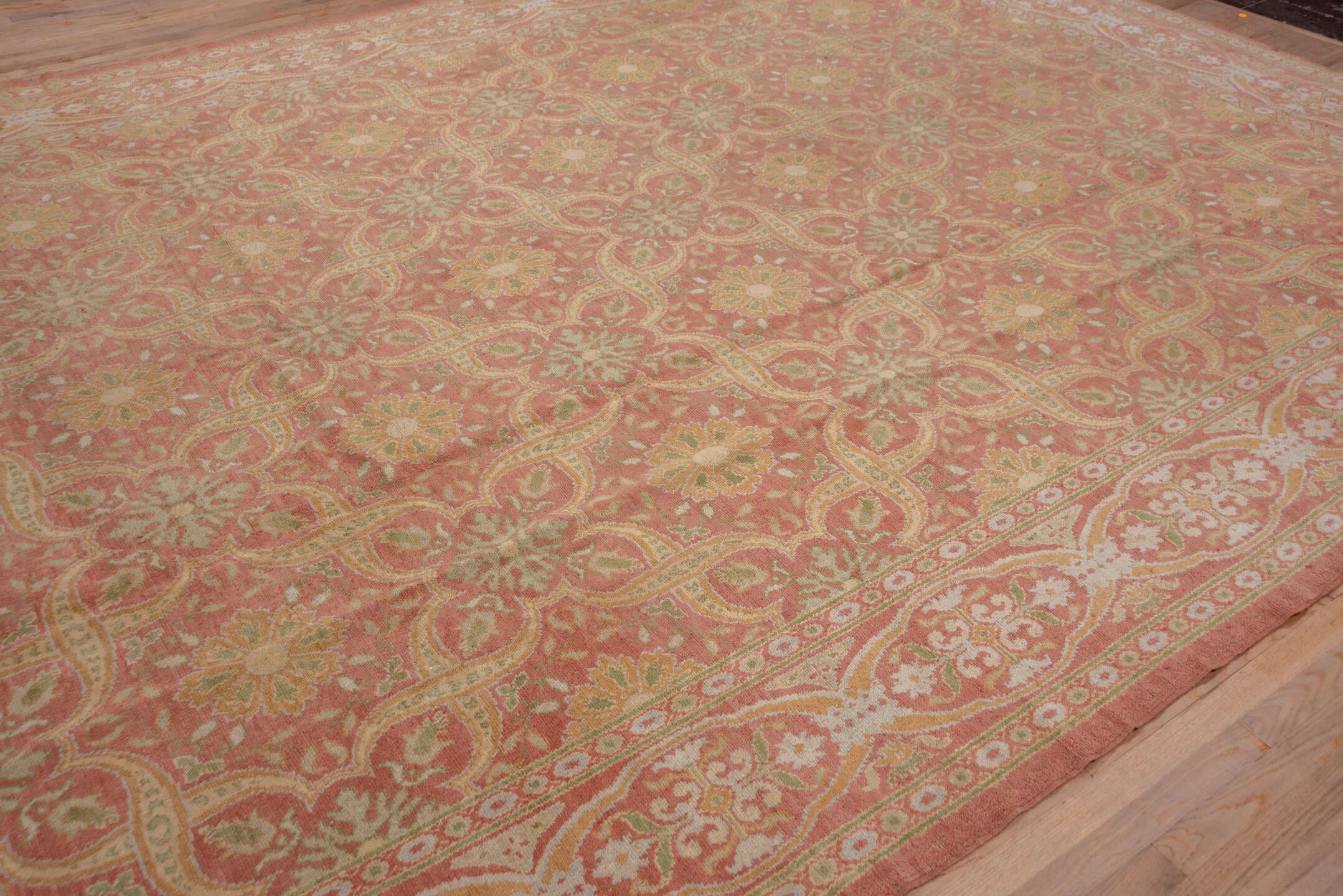 10' x 20' one-of-a-kind handmade antique Spanish rug. Color palette: coral, ivory, gold, sage, terra cotta, terracotta