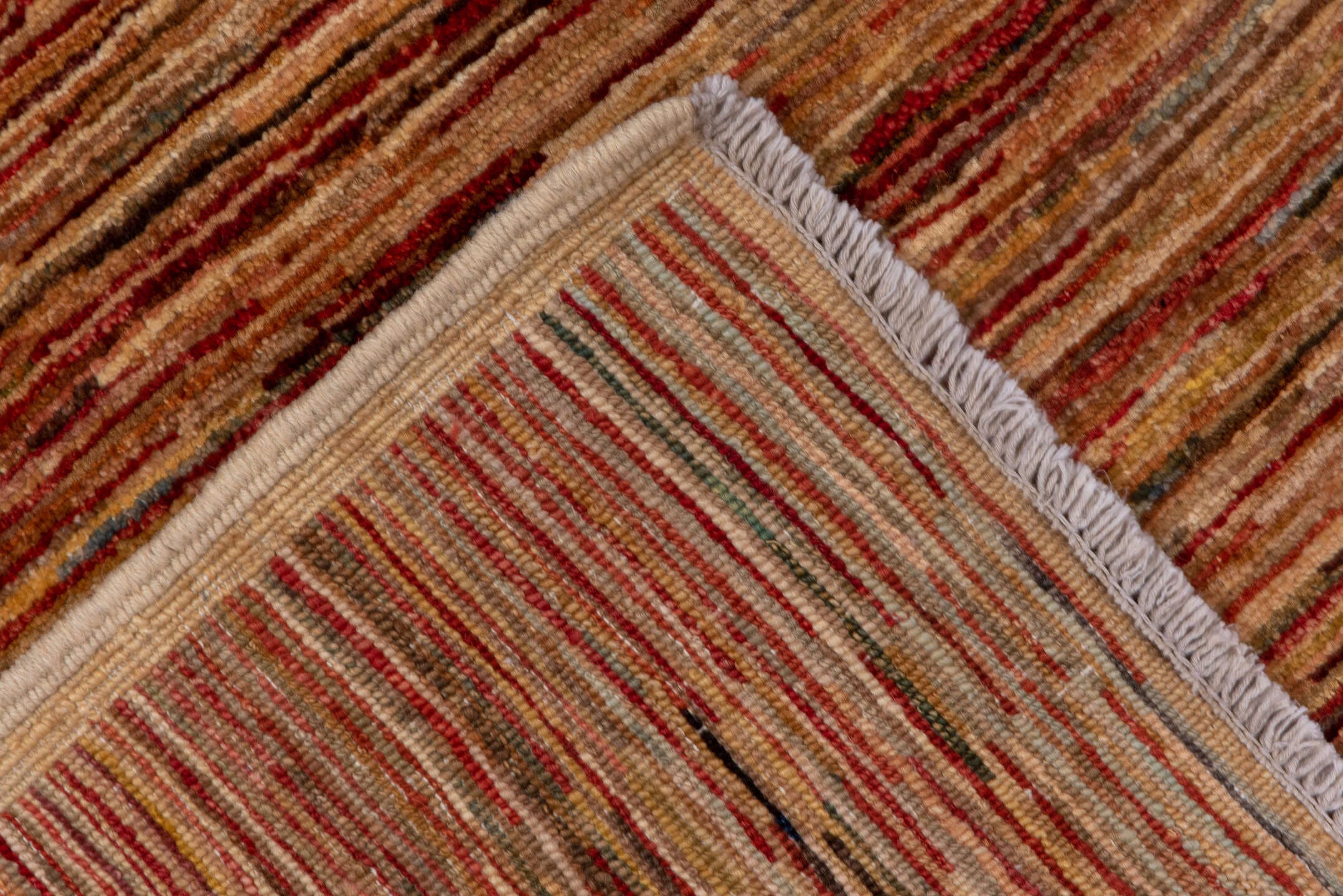 6' x 9' one-of-a-kind handmade vintage Afghan medium size rug. Color palette: camel, terra cotta, rust, beige, taupe