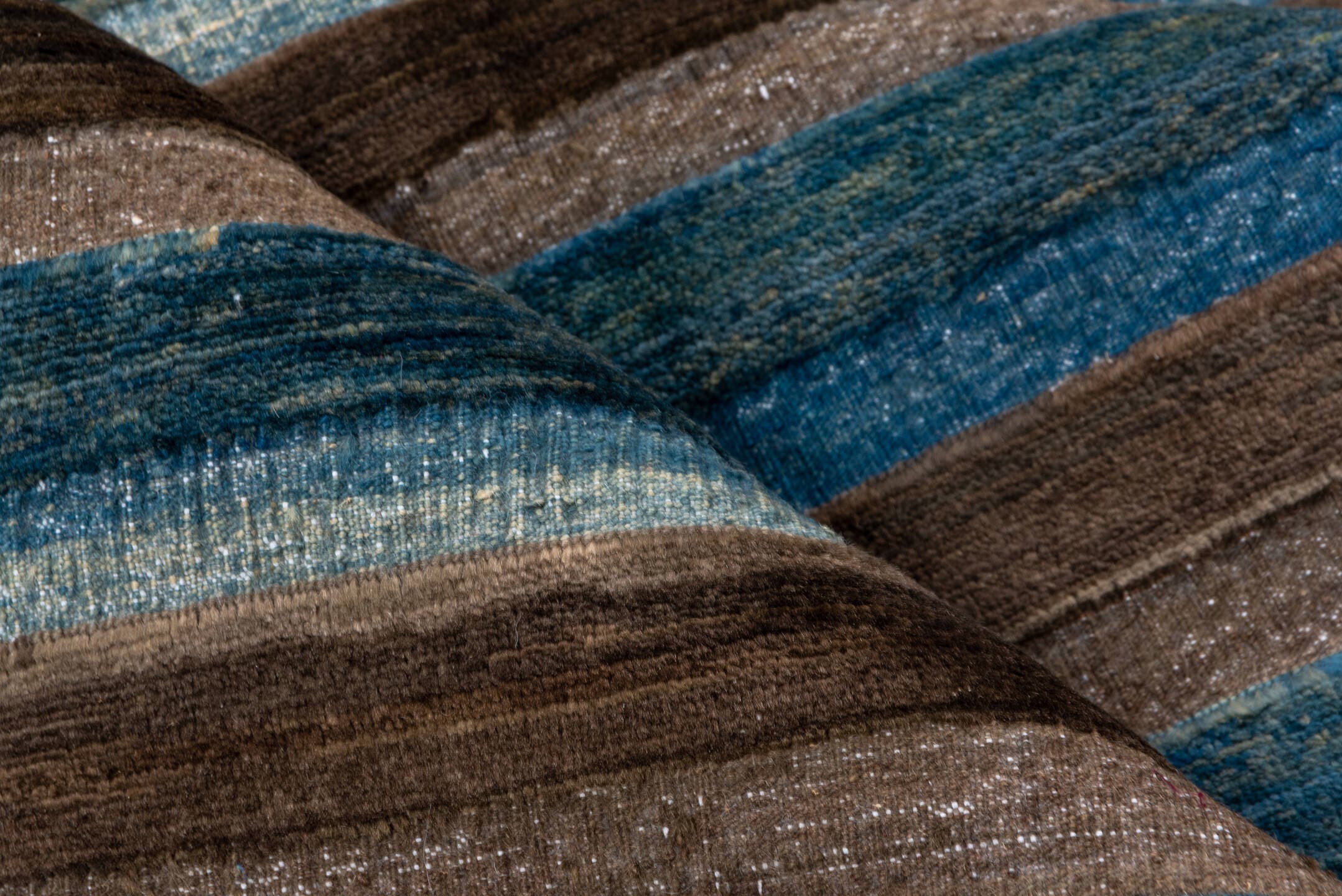4' x 6' one-of-a-kind handmade vintage Afghan small size rug. Color palette: taupe, teal, sky blue, slate, brown, camel