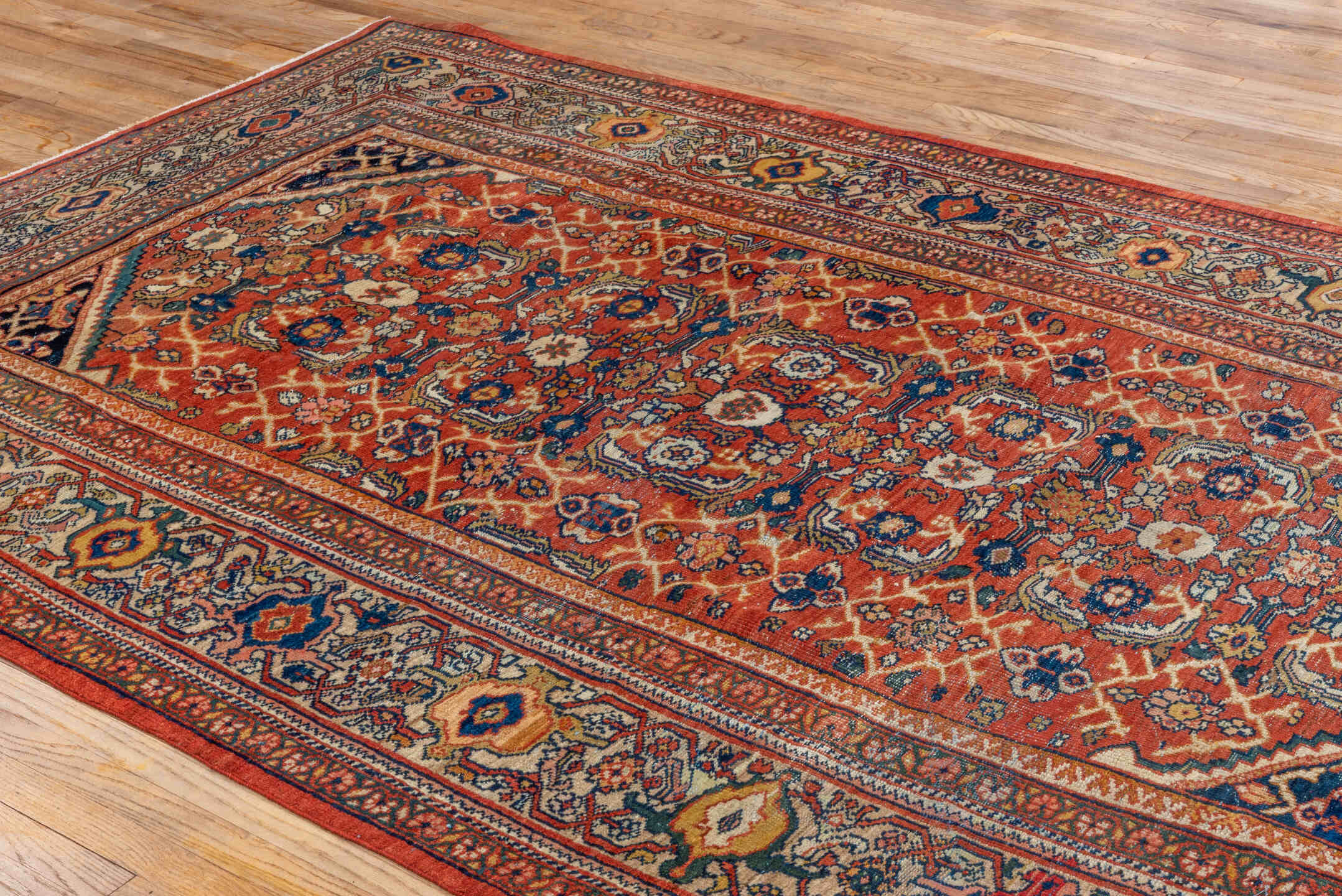 6' x 10' one-of-a-kind handmade antique Mahal large size rug. Color palette: terra cotta, ivory, navy, rust, camel, gold