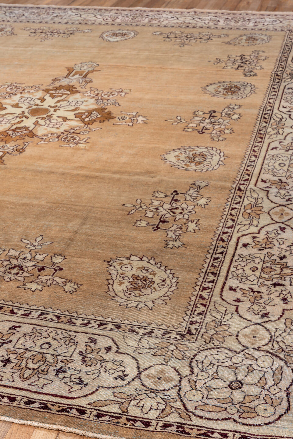 8' x 11' one-of-a-kind handmade antique Amritzar large size rug. Color palette: camel, ivory, taupe, brown, rust, burgundy