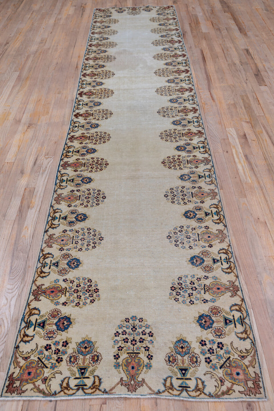 2' x 13' one-of-a-kind handmade antique Tabriz runner rug. Color palette: ivory, navy, taupe, rust, gold, camel, rose