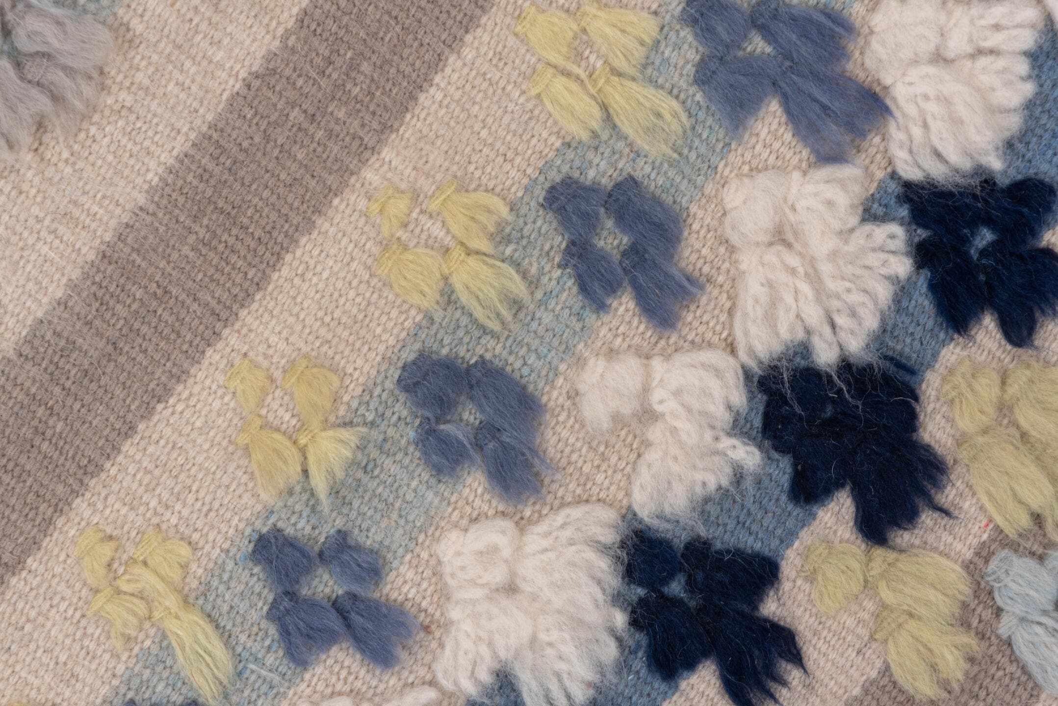 3' x 6' one-of-a-kind handmade vintage Tulu small size rug. Color palette: ivory, pale blue, taupe, navy, butter yellow