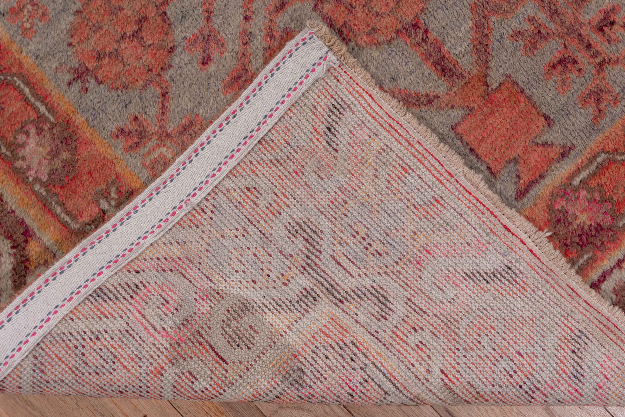 5' x 10' one-of-a-kind handmade vintage Khotan medium size rug. Color palette: rose, rust, taupe, terra cotta, dusty blue