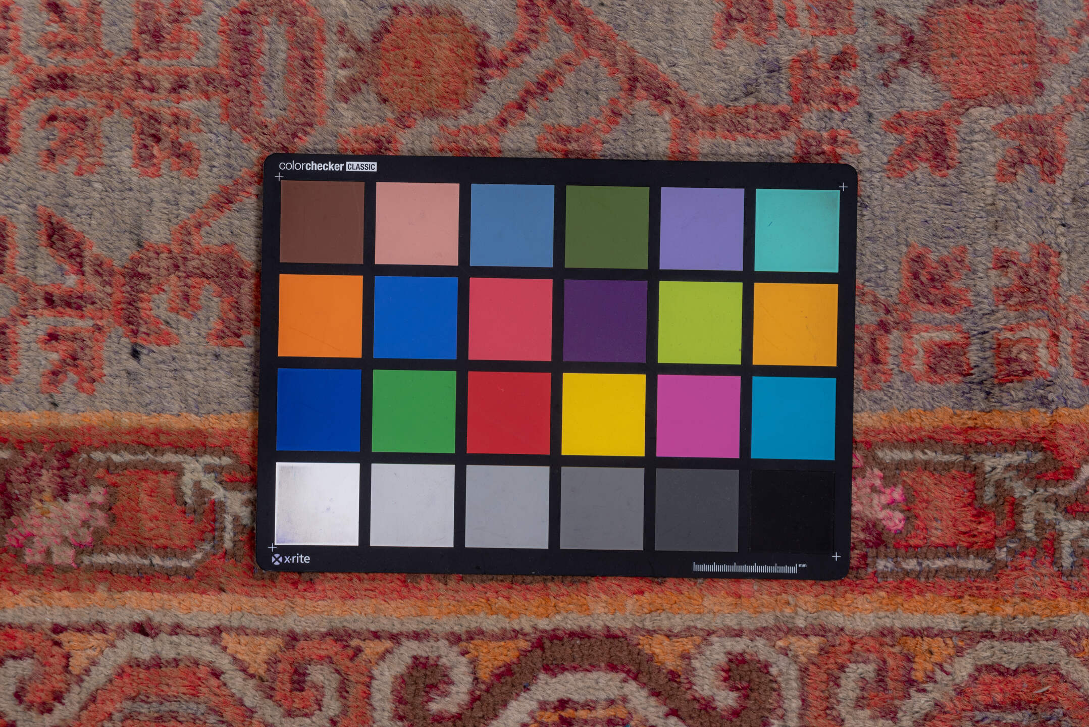 5' x 10' one-of-a-kind handmade vintage Khotan medium size rug. Color palette: brown, gray, pink, red, redwood