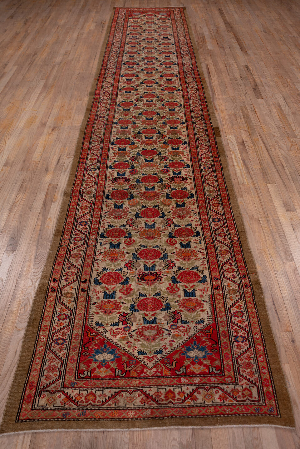 3' x 17' one-of-a-kind handmade antique Malayer runner rug. Color palette: ivory, rust, red, indigo, camel, blue, taupe