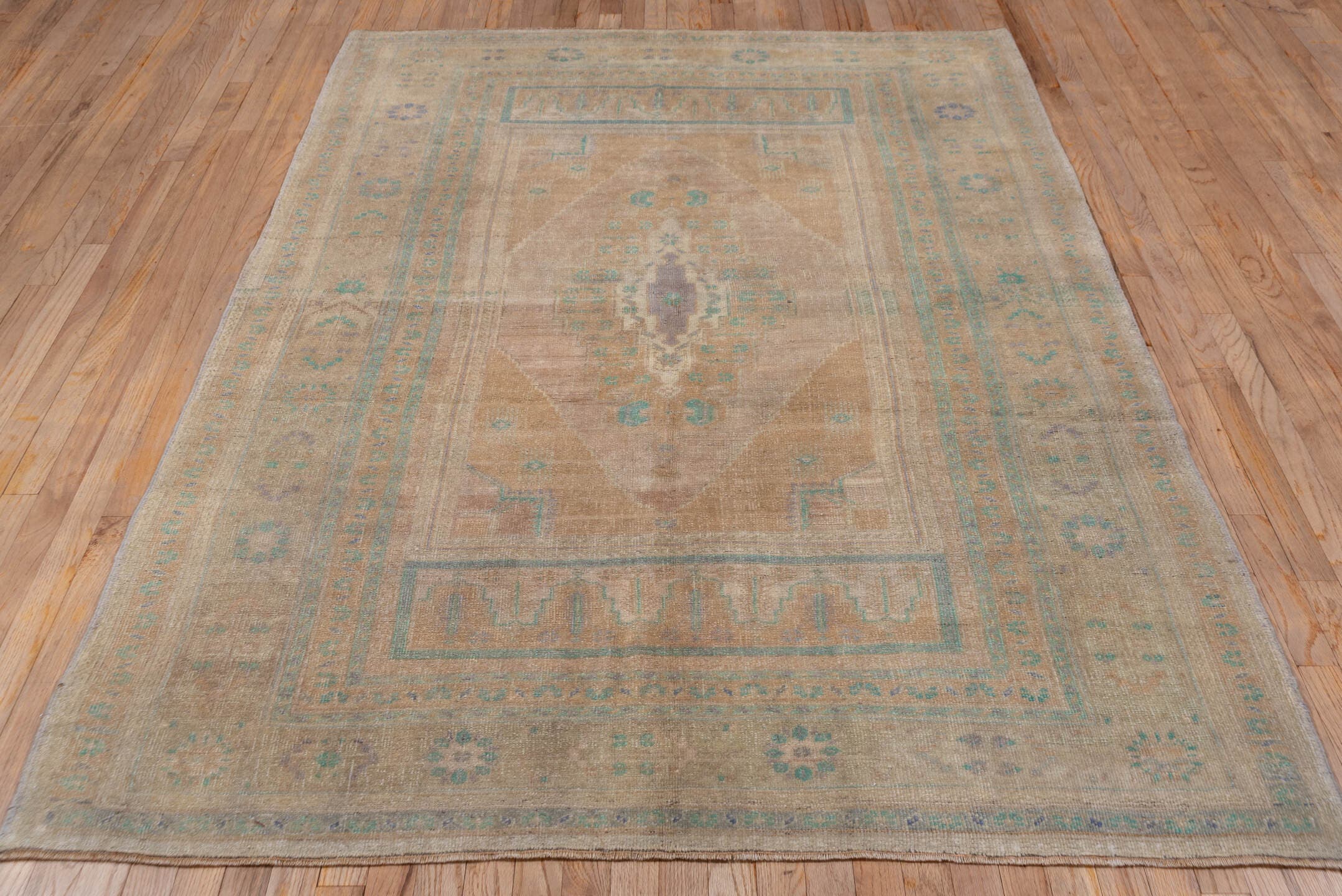 5' x 8' one-of-a-kind handmade antique Oushak medium size rug. Color palette: beige, taupe, aqua, ivory, lavender, sand