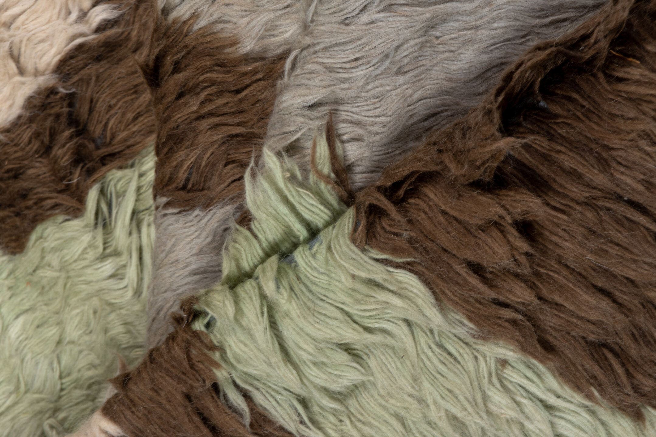 10' x 12' one-of-a-kind handmade vintage Tulu large size rug. Color palette: gray, brown, ivory, sky_blue, pale_sage