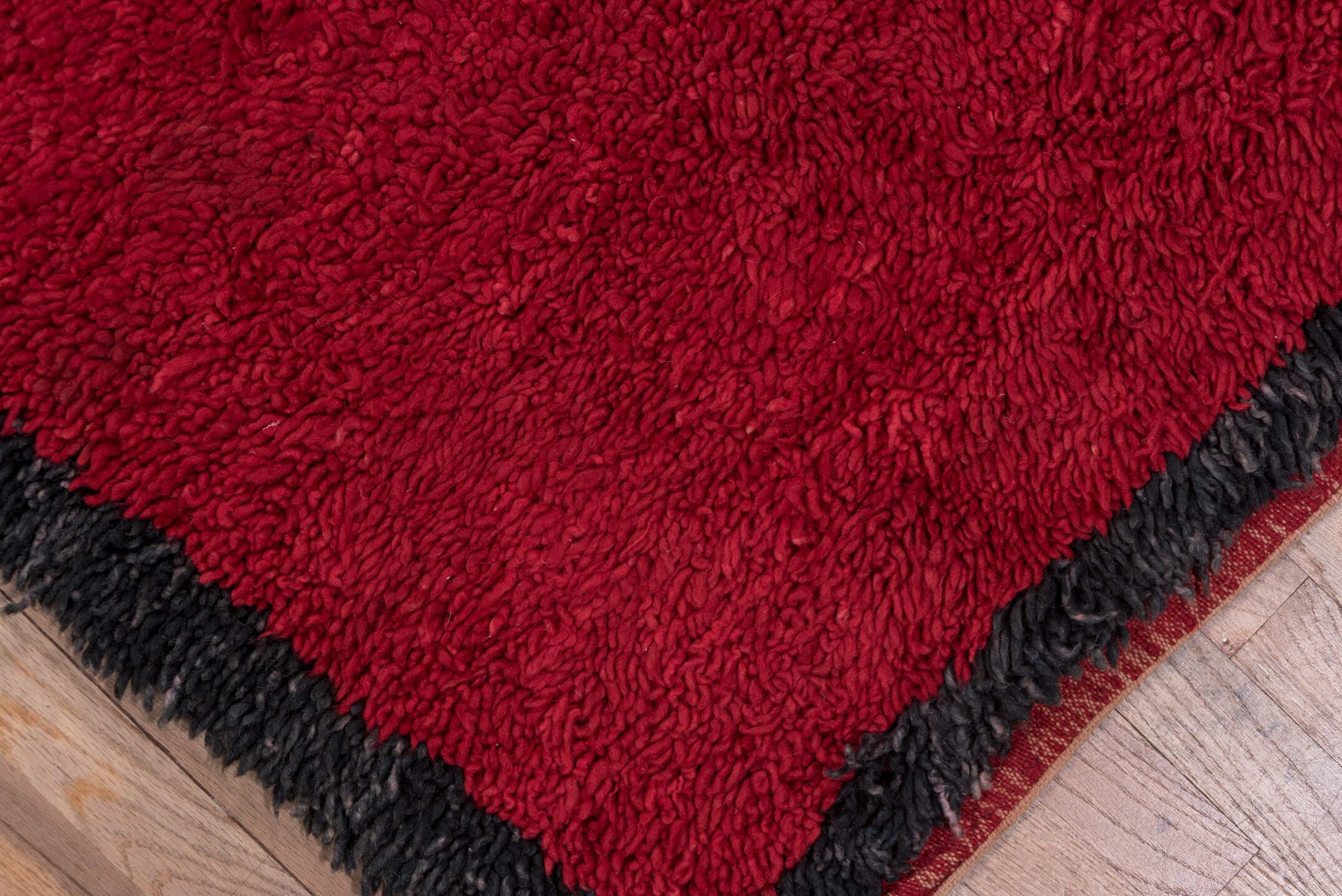 3' x 10' one-of-a-kind handmade vintage Moroccan runner rug. Color palette: crimson, charcoal, burgundy, red, gray, black