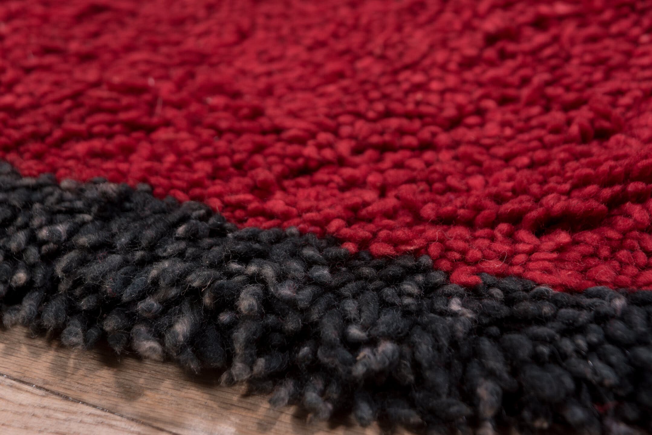 3' x 10' one-of-a-kind handmade vintage Moroccan runner rug. Color palette: crimson, charcoal, burgundy, red, gray, black