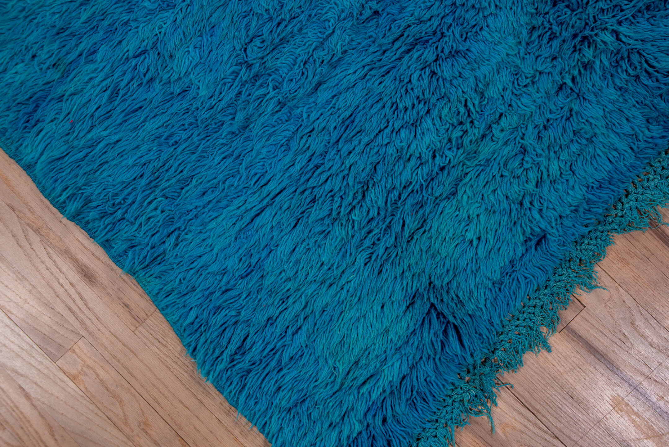 5' x 9' one-of-a-kind handmade vintage Moroccan medium size rug. Color palette: turquoise, teal, cobalt, blue