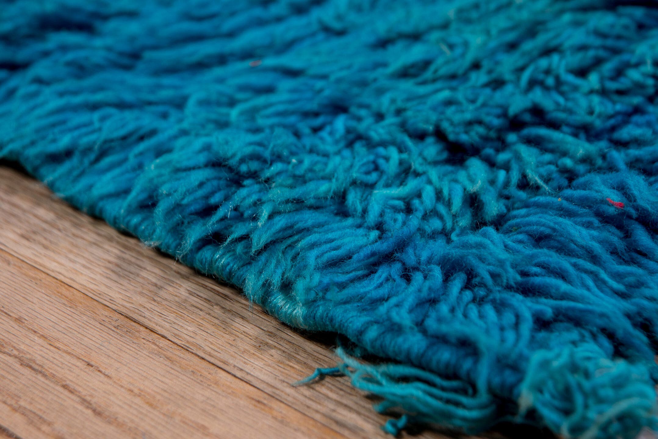 5' x 9' one-of-a-kind handmade vintage Moroccan medium size rug. Color palette: turquoise, teal, cobalt, blue