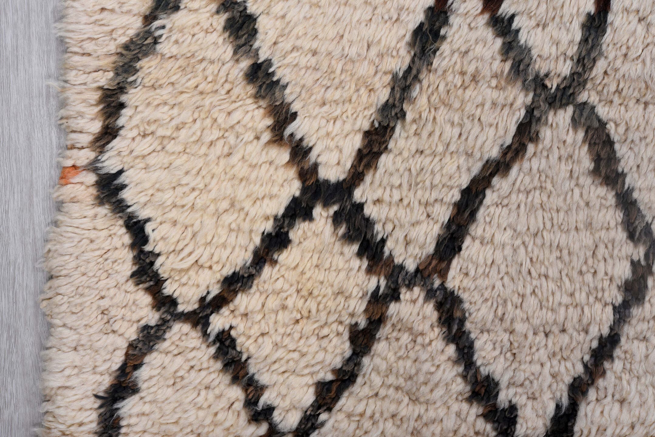 6' x 9' one-of-a-kind handmade vintage Moroccan medium size rug. Color palette: ivory, charcoal, rust, taupe, gray, black