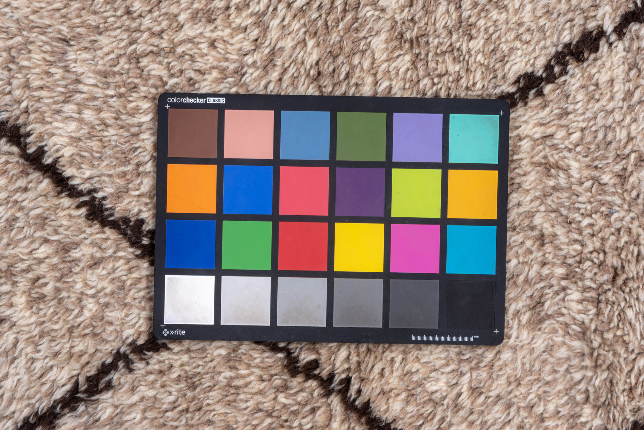 8' x 12' one-of-a-kind handmade vintage Moroccan large size rug. Color palette: brown, gray, light gray, off-white, pink