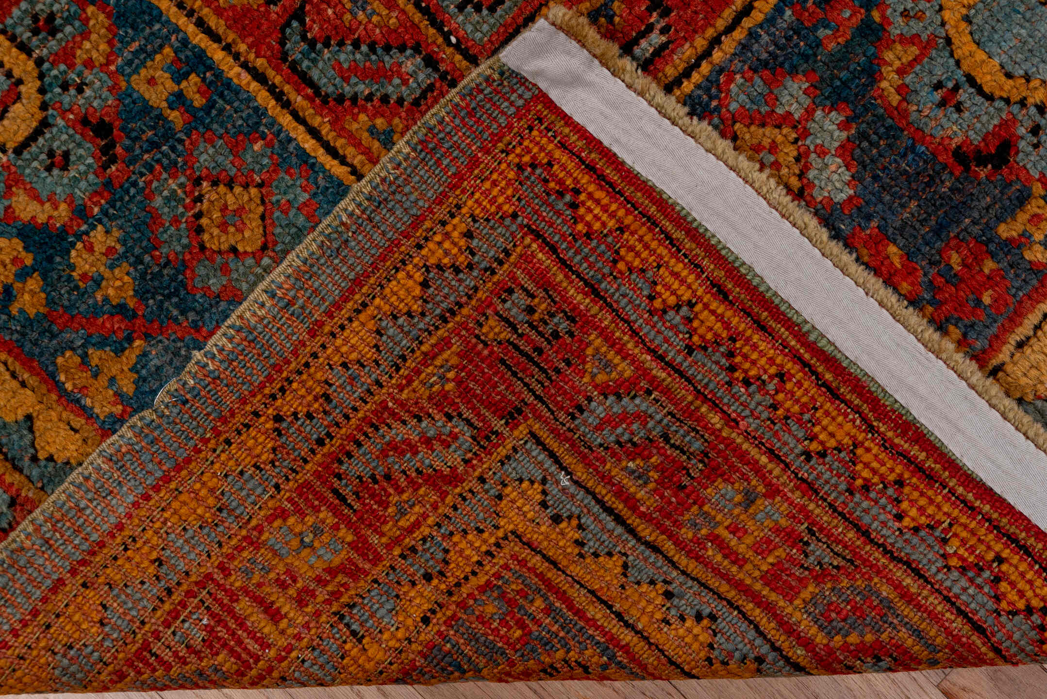 7' x 8' one-of-a-kind handmade antique Oushak rug. Color palette: rust, blue, gold, ivory, slate, terra cotta, charcoal