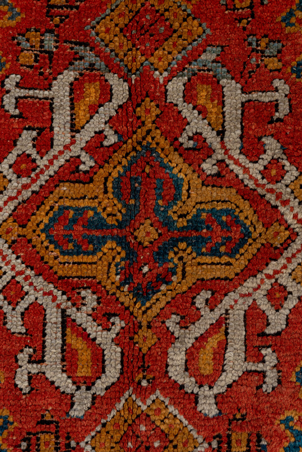 7' x 8' one-of-a-kind handmade antique Oushak rug. Color palette: rust, blue, gold, ivory, slate, terra cotta, charcoal