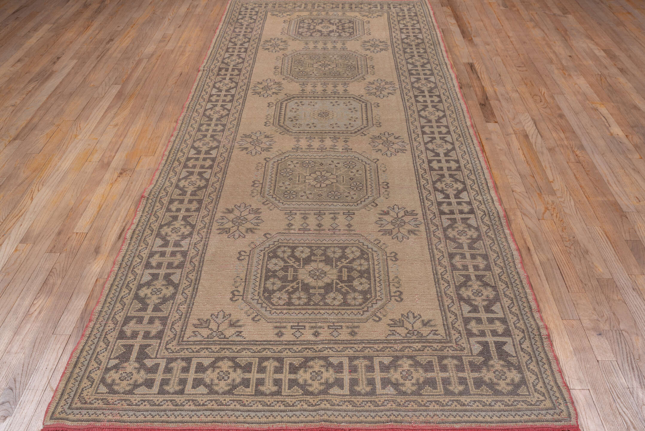 4' x 11' one-of-a-kind handmade vintage Oushak runner rug. Color palette: brown, gray, light gray, off-white, pink, snow