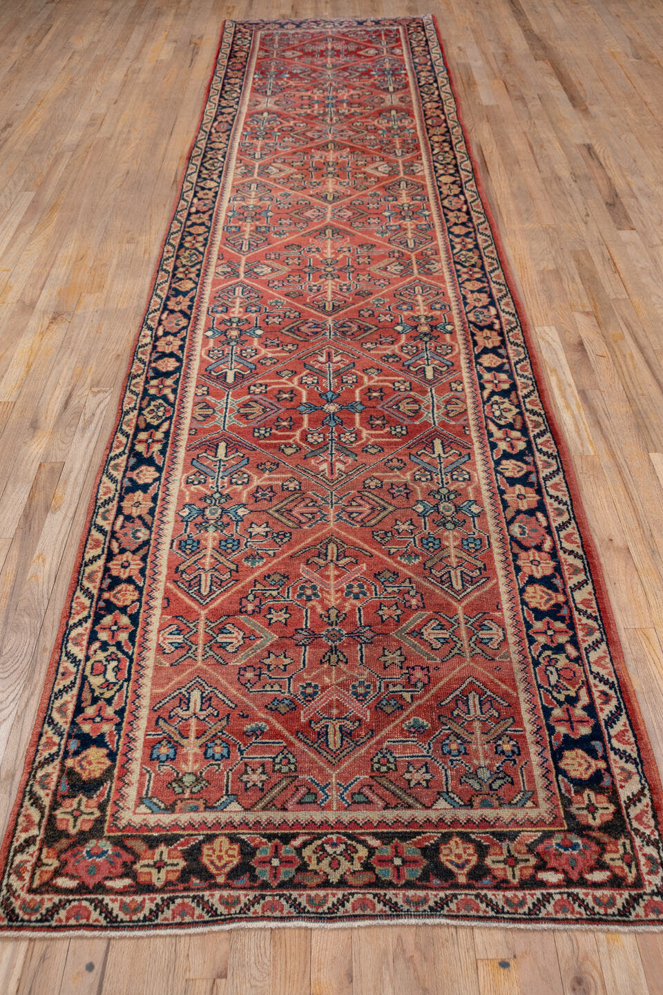 3' x 15' one-of-a-kind handmade antique Mahal runner rug. Color palette: rust, terra cotta, navy, ivory, slate, rose