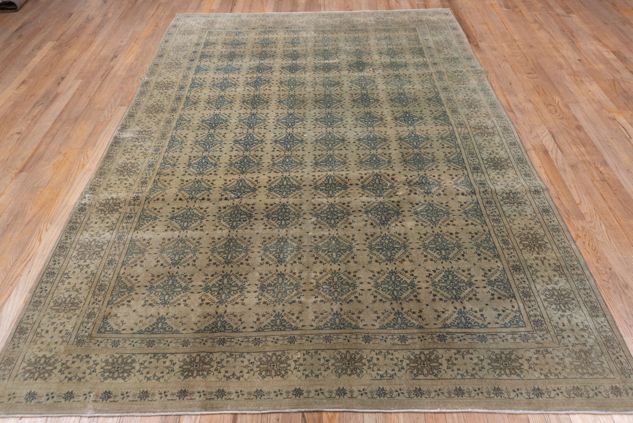 6' x 10' one-of-a-kind handmade antique Sivas large size rug. Color palette: ivory, pale blue, taupe, beige, soft brown