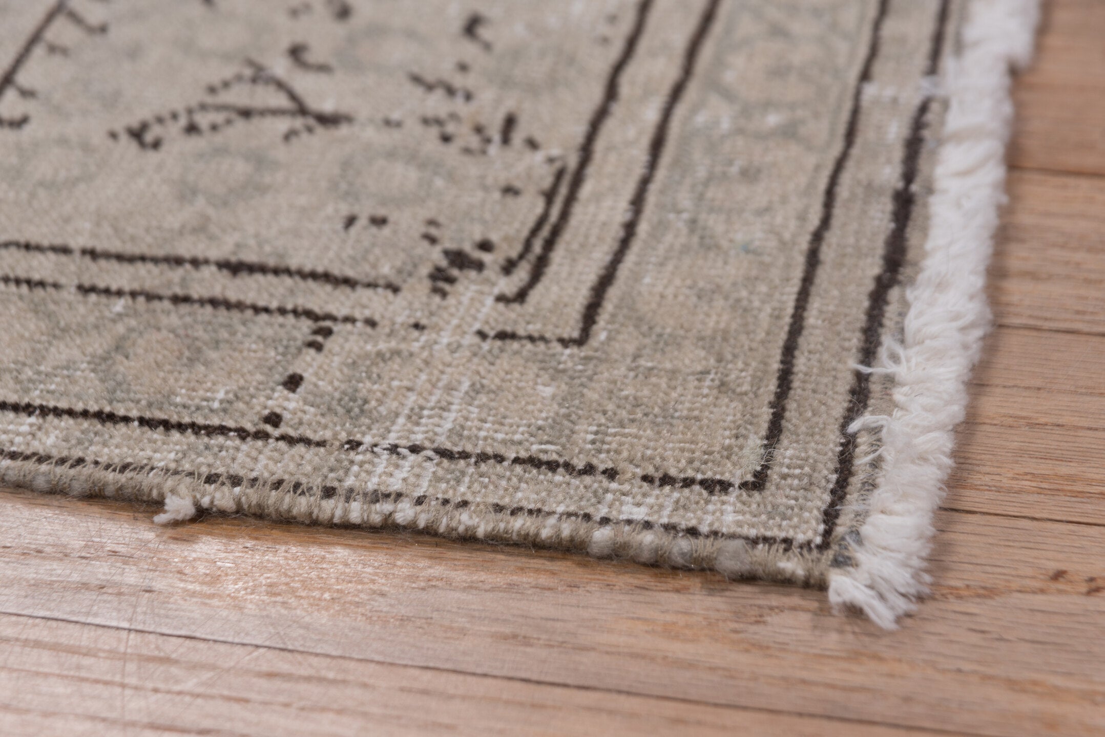 6' x 9' one-of-a-kind handmade vintage Sivas medium size rug. Color palette: black, brown, gray, light gray, off-white, pink