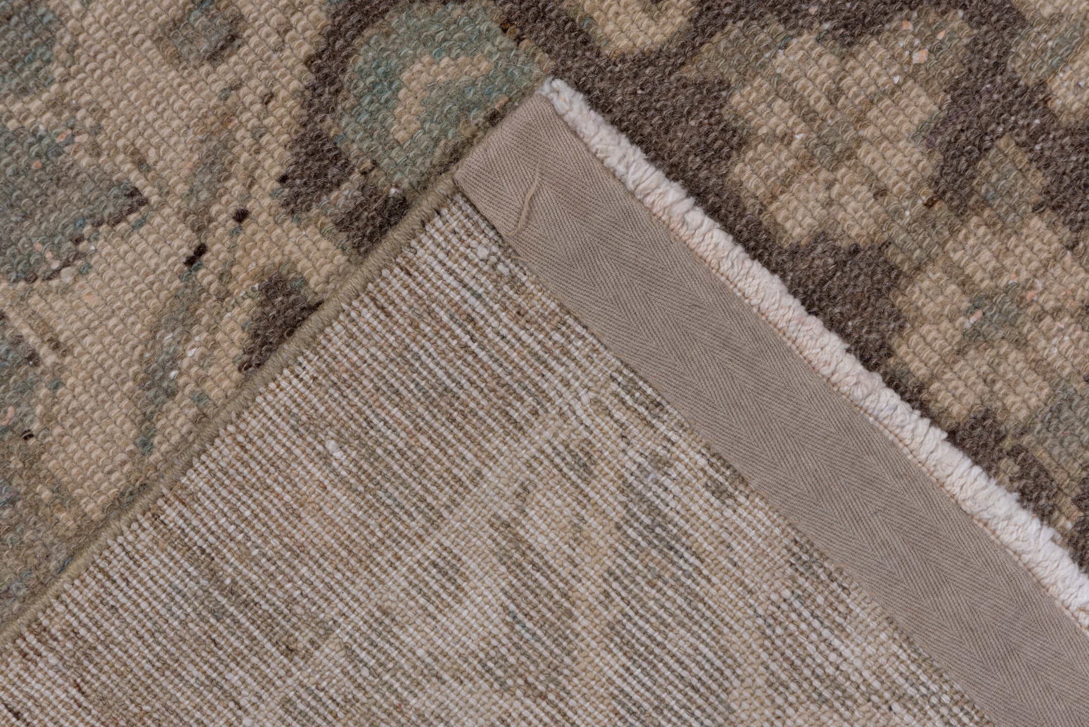 5' x 9' one-of-a-kind handmade antique Baktiary medium size rug. Color palette: taupe, ivory, slate, charcoal, camel