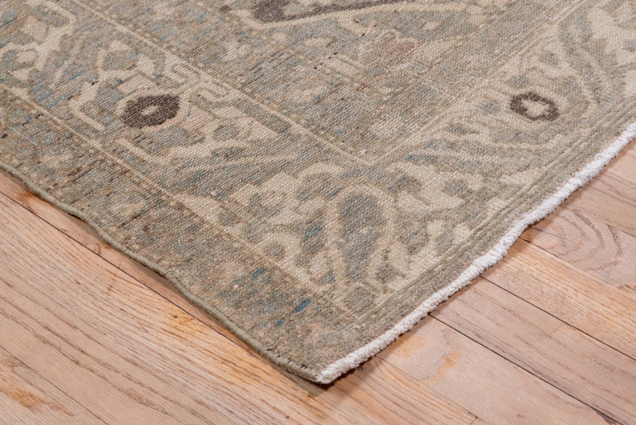 5' x 9' one-of-a-kind handmade antique Baktiary medium size rug. Color palette: taupe, ivory, slate, charcoal, camel