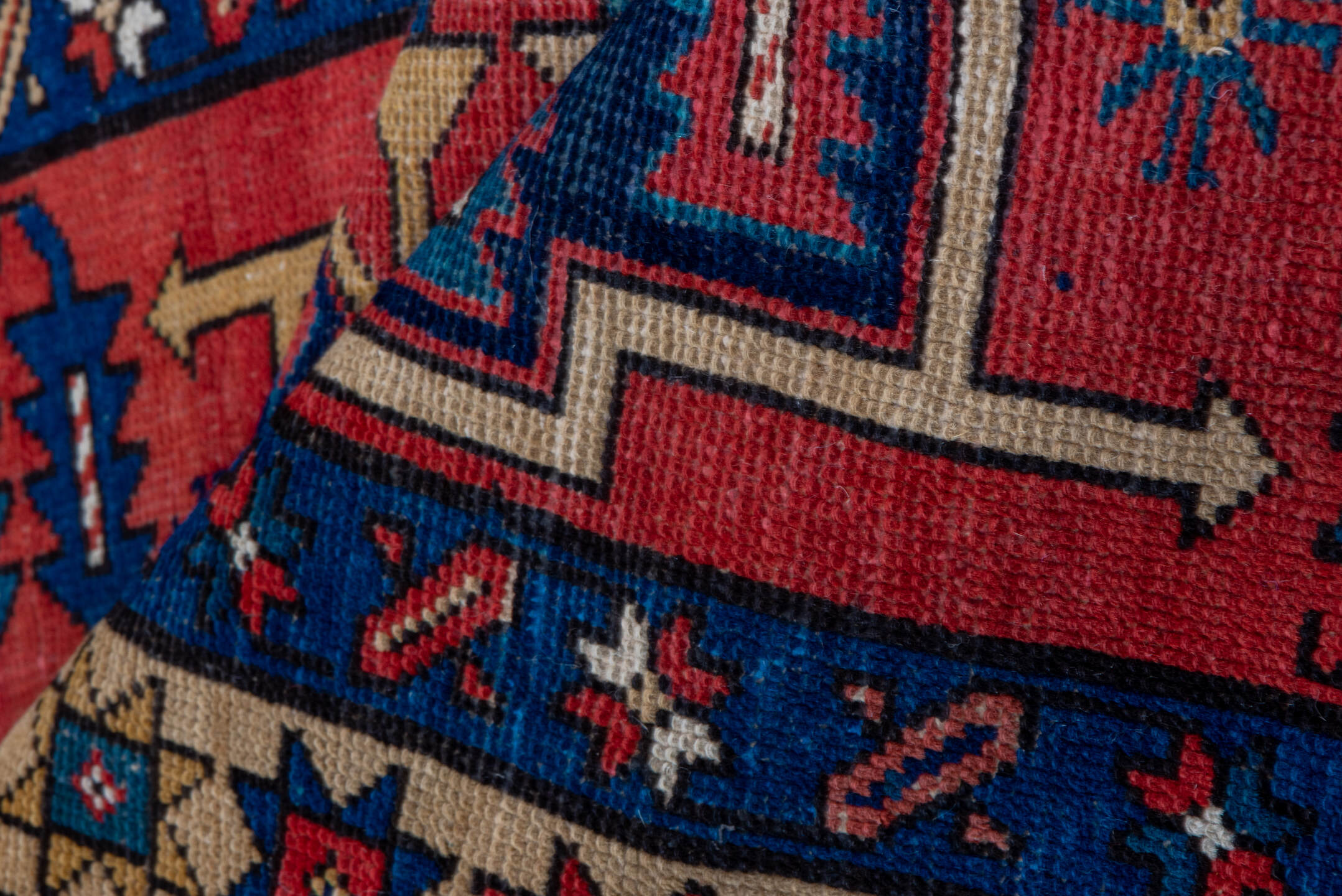 3' x 10' one-of-a-kind handmade antique Heriz runner rug. Color palette: red, navy, ivory, camel, rust, charcoal, blue