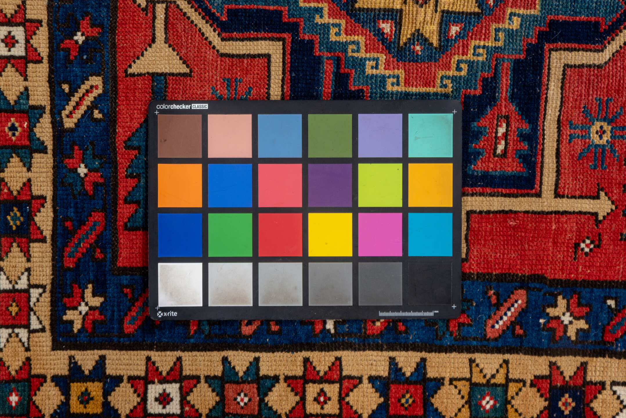 3' x 10' one-of-a-kind handmade vintage Heriz runner rug. Color palette: brown, gray, pink, red