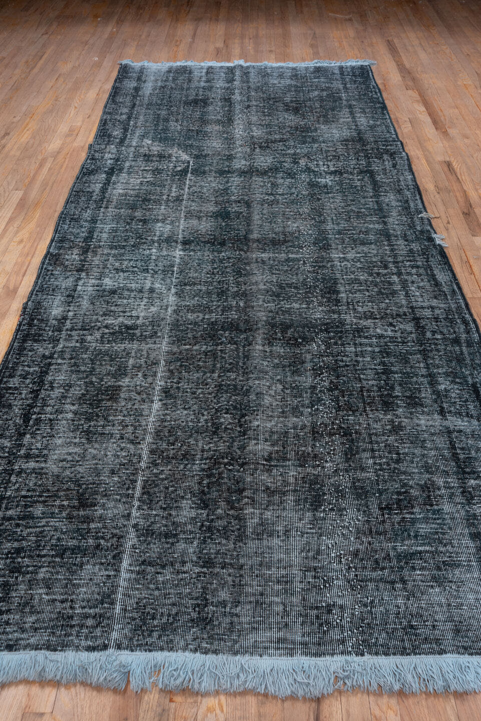 5' x 12' one-of-a-kind handmade vintage Sparta rug. Color palette: charcoal, slate, steel_blue, gray, black, blue
