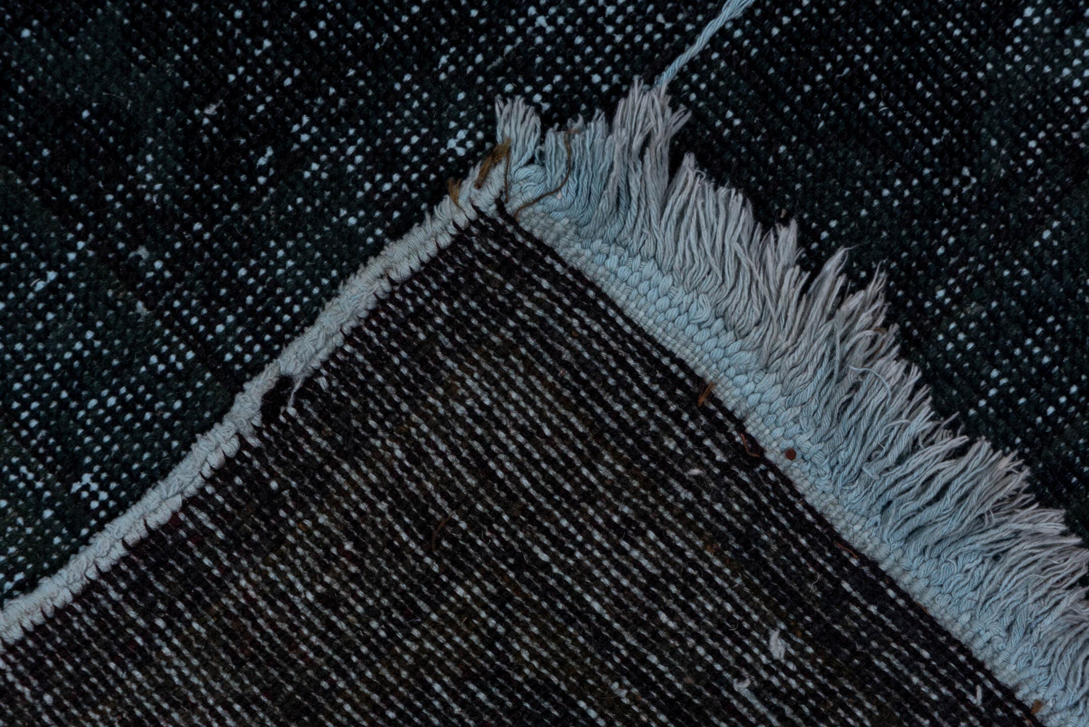 4' x 11' one-of-a-kind handmade vintage Overdyed runner rug. Color palette: charcoal, slate, blue, ivory, gray, black