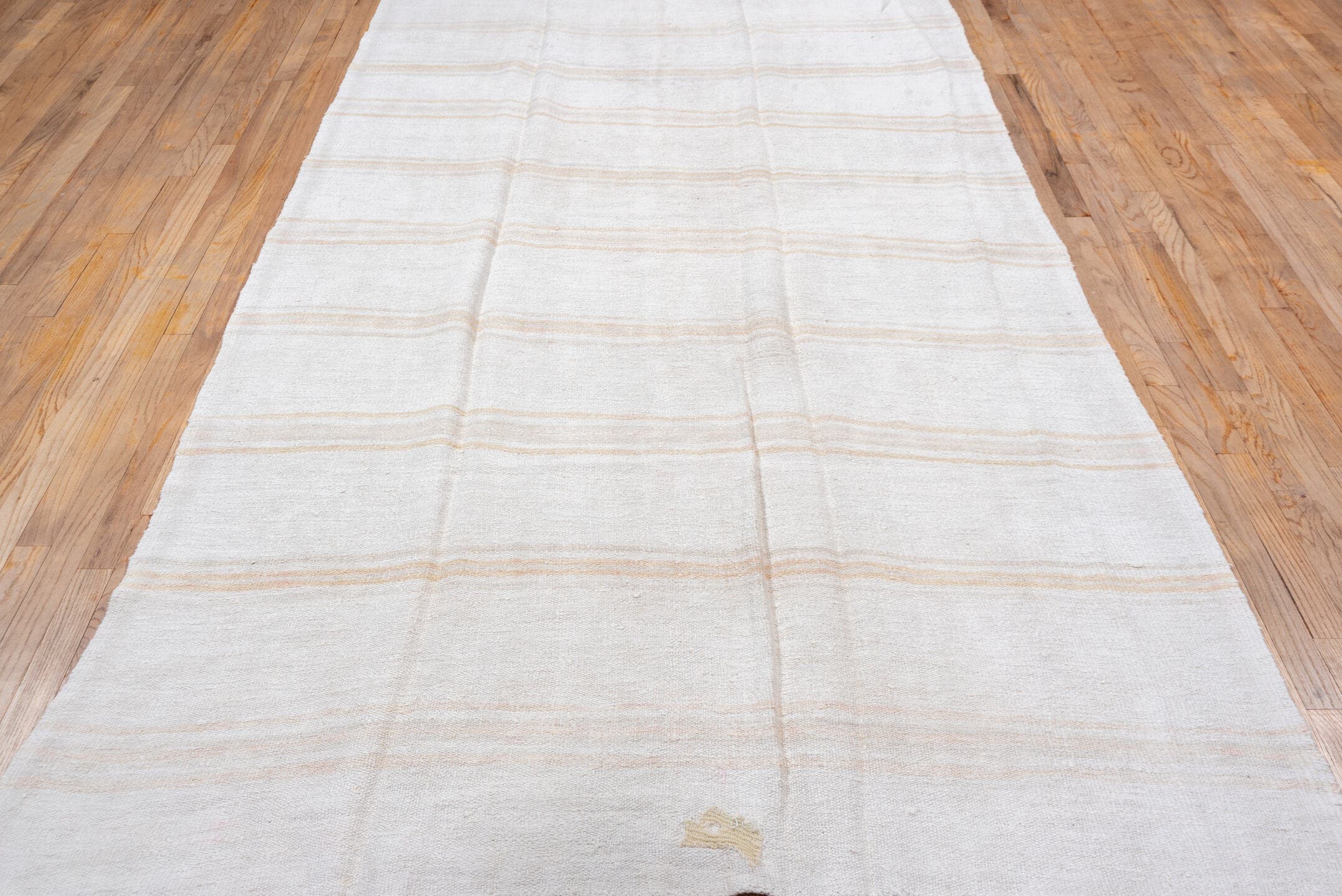 5' x 11' one-of-a-kind handmade vintage Hemp Kilim rug. Color palette: ivory, cream, beige, sand