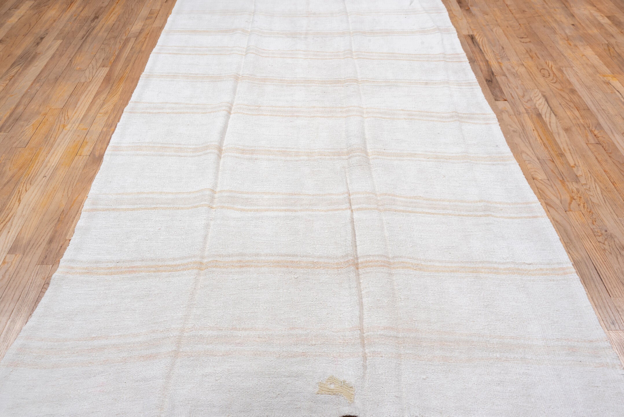 5' x 11' one-of-a-kind handmade vintage Hemp Kilim rug. Color palette: ivory, cream, beige, sand