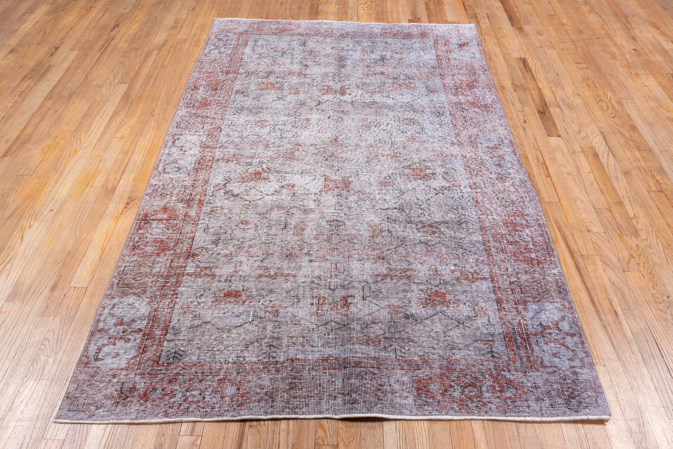 5' x 8' one-of-a-kind handmade vintage Sparta medium size rug. Color palette: brown, dim gray, gray, light gray, off-white