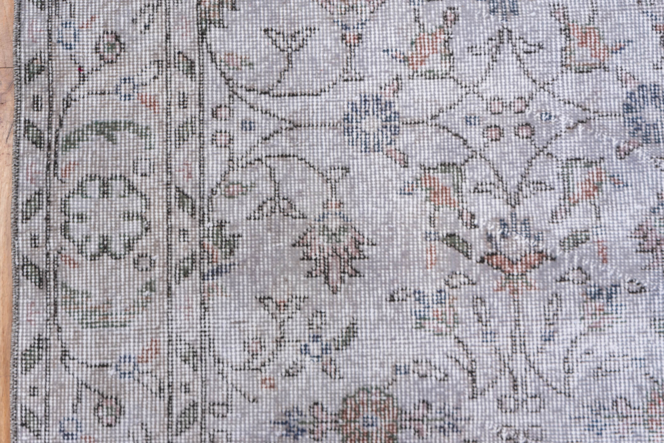 5' x 9' one-of-a-kind handmade antique Sparta medium size rug. Color palette: ivory, taupe, sage, rose, slate, beige, gray