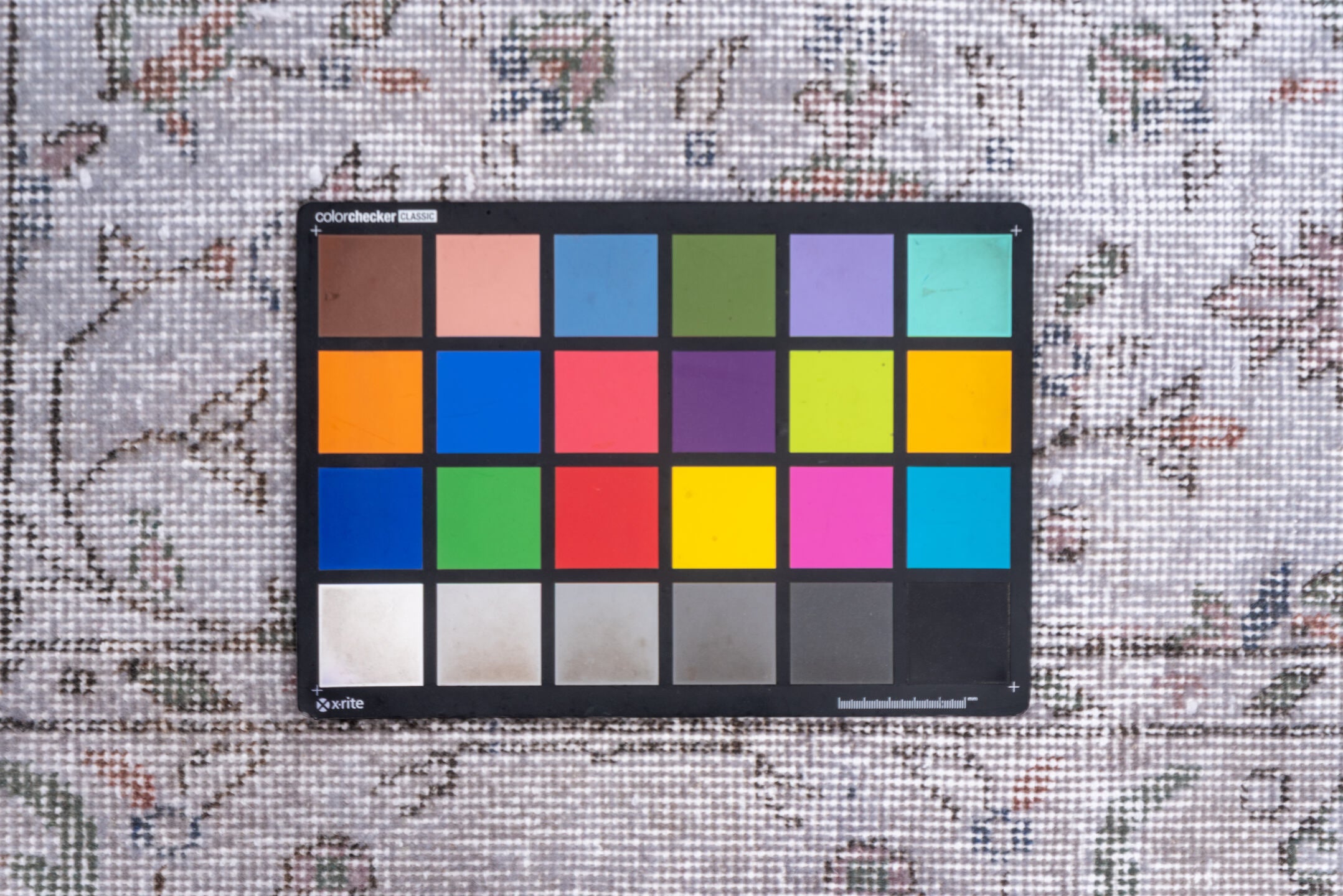 5' x 9' one-of-a-kind handmade antique Sparta medium size rug. Color palette: ivory, taupe, sage, rose, slate, beige, gray