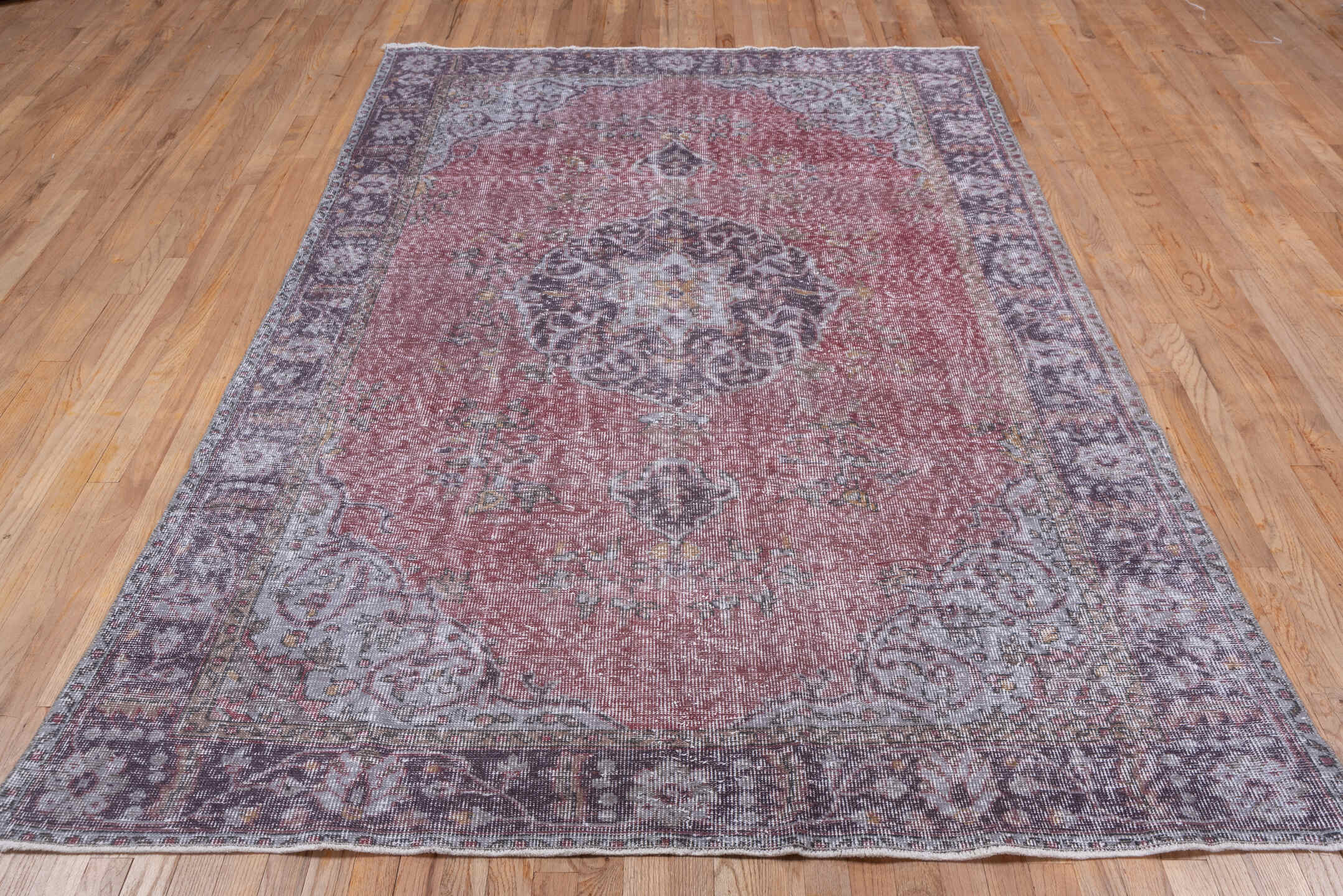 5' x 8' one-of-a-kind handmade antique Sparta medium size rug. Color palette: rose, ivory, taupe, charcoal, dusty mauve