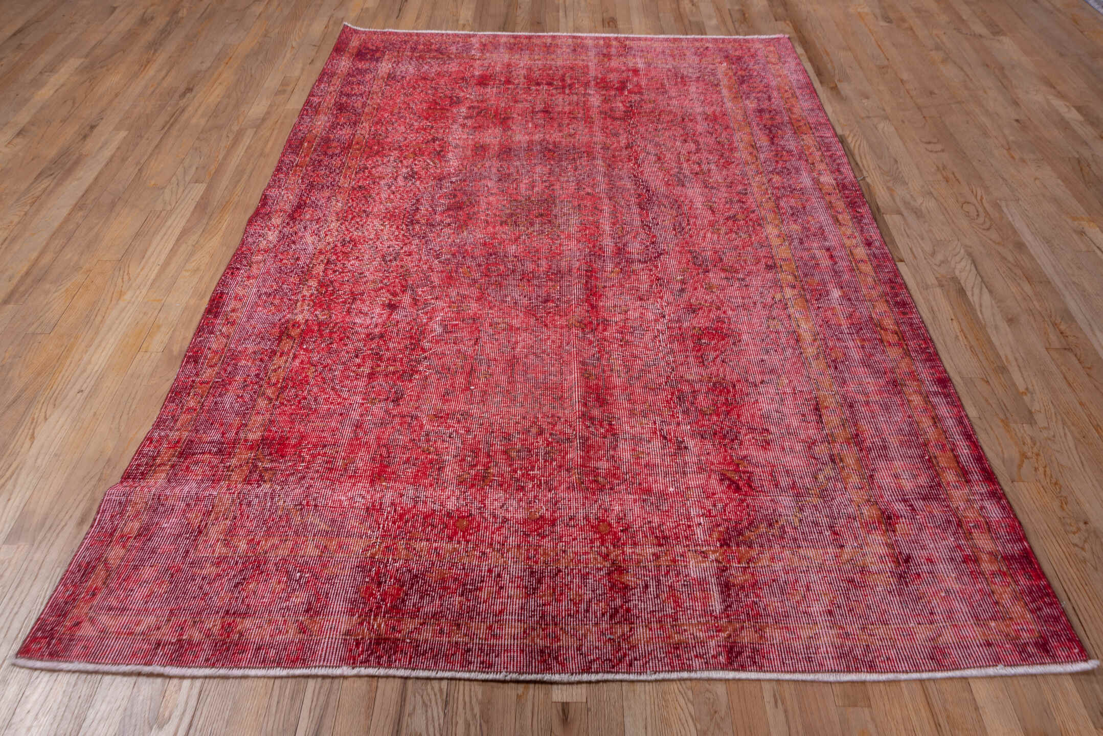 5' x 8' one-of-a-kind handmade vintage Overdyed medium size rug. Color palette: brown, indian red, light coral, light pink