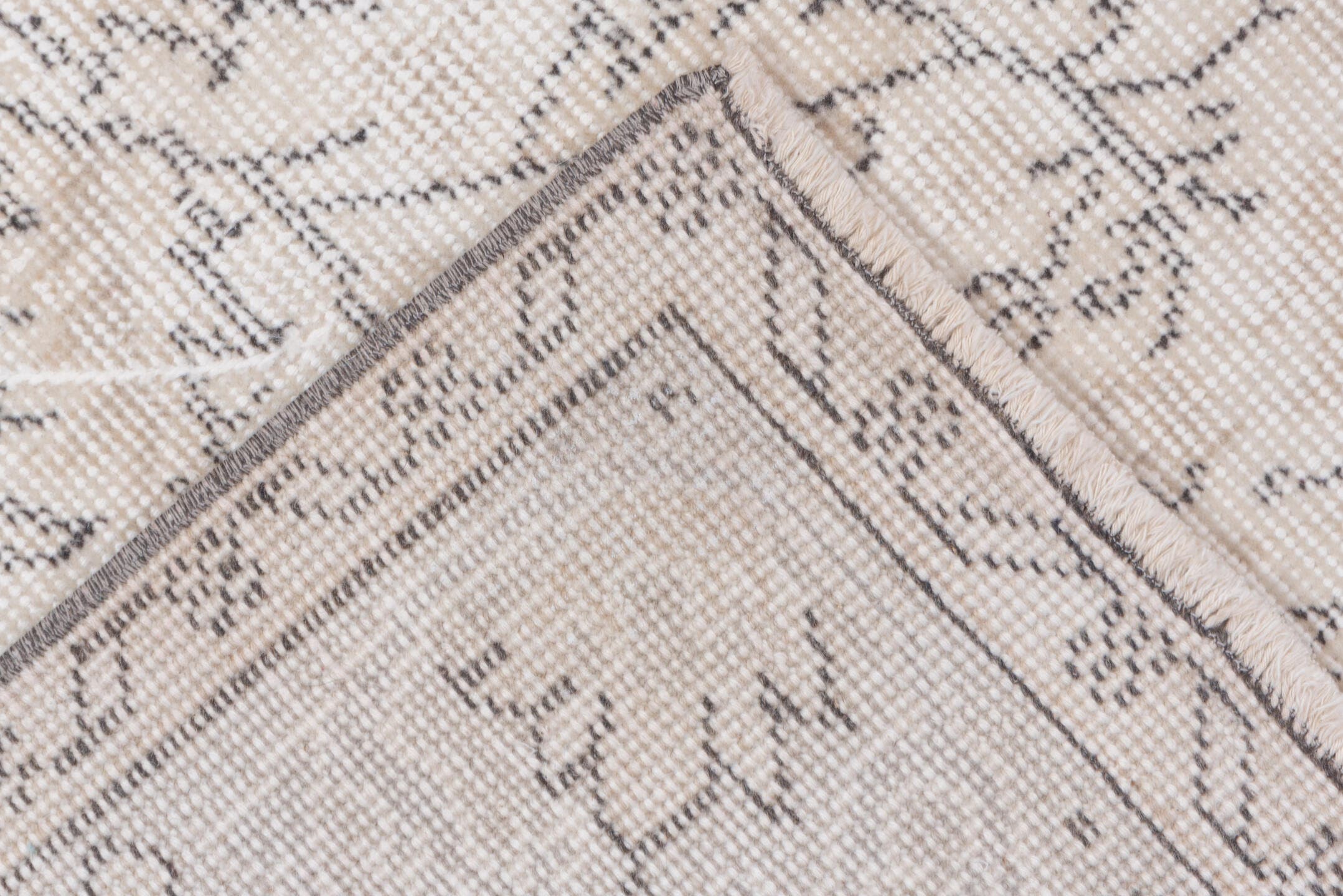 5' x 9' one-of-a-kind handmade antique Sparta medium size rug. Color palette: ivory, taupe, beige, cream, pale gray, gray