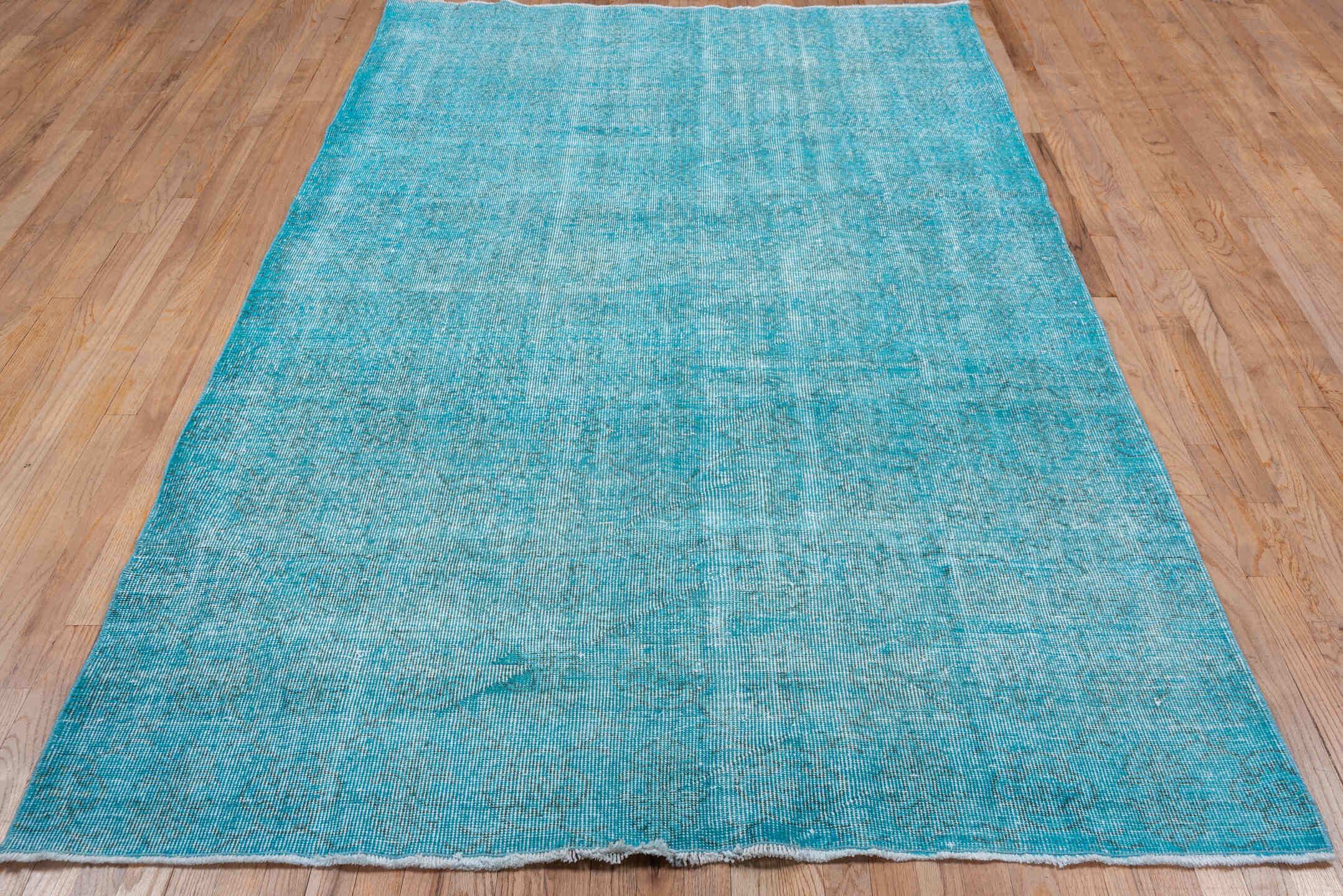 5' x 9' one-of-a-kind handmade antique Overdyed medium size rug. Color palette: aqua, turquoise, ice blue, ivory, teal