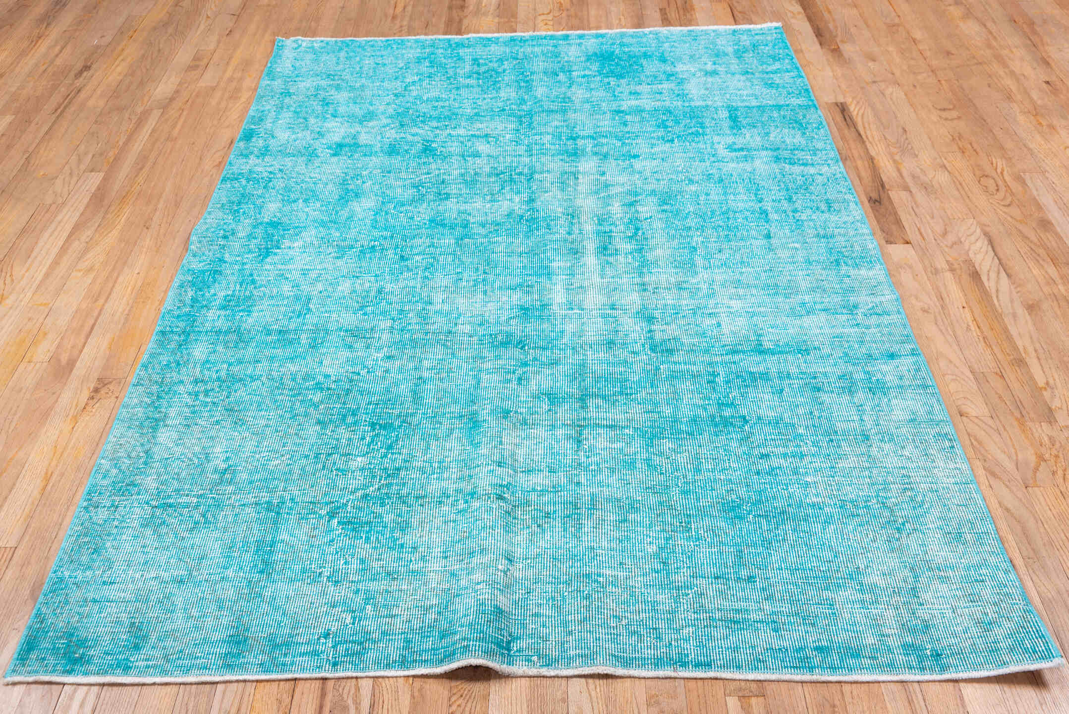 5' x 7' one-of-a-kind handmade antique Overdyed rug. Color palette: aqua, turquoise, ivory, teal