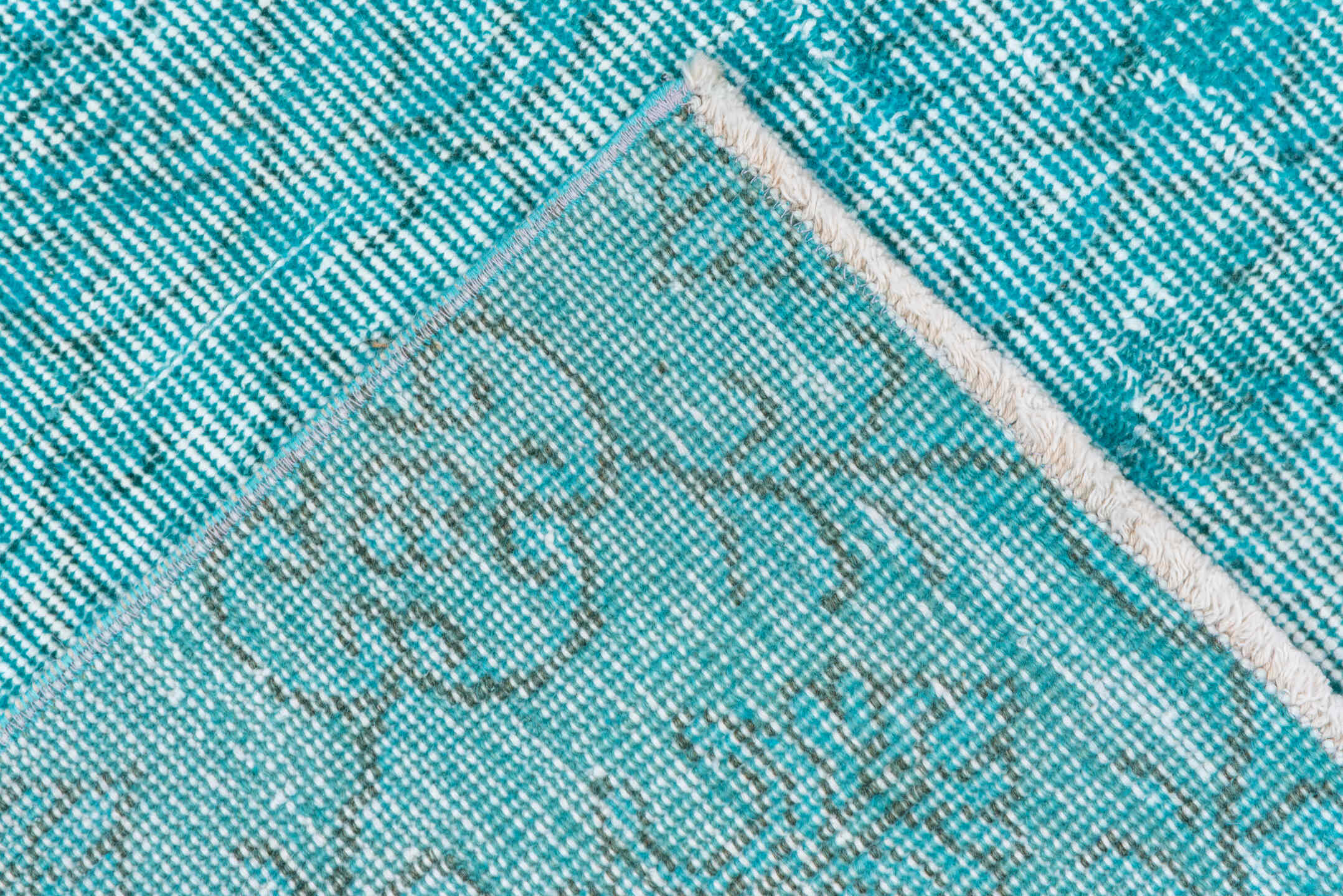 5' x 7' one-of-a-kind handmade antique Overdyed rug. Color palette: aqua, turquoise, ivory, teal