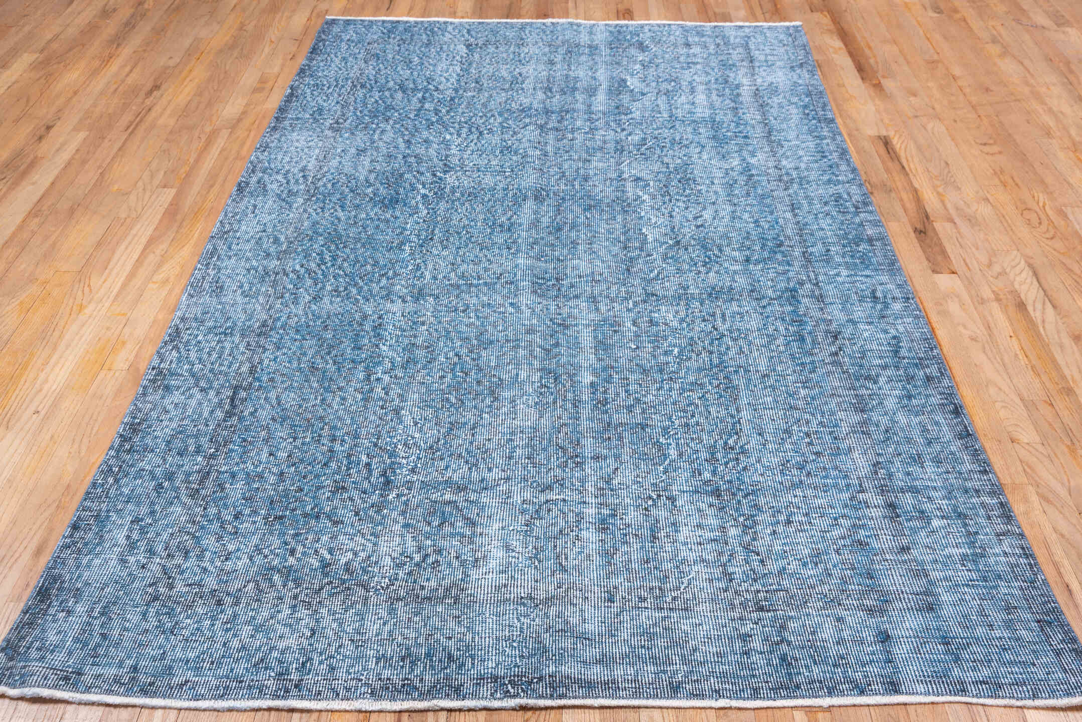 5' x 9' one-of-a-kind handmade vintage Overdyed medium size rug. Color palette: blue, fiord, gray, light blue, light gray