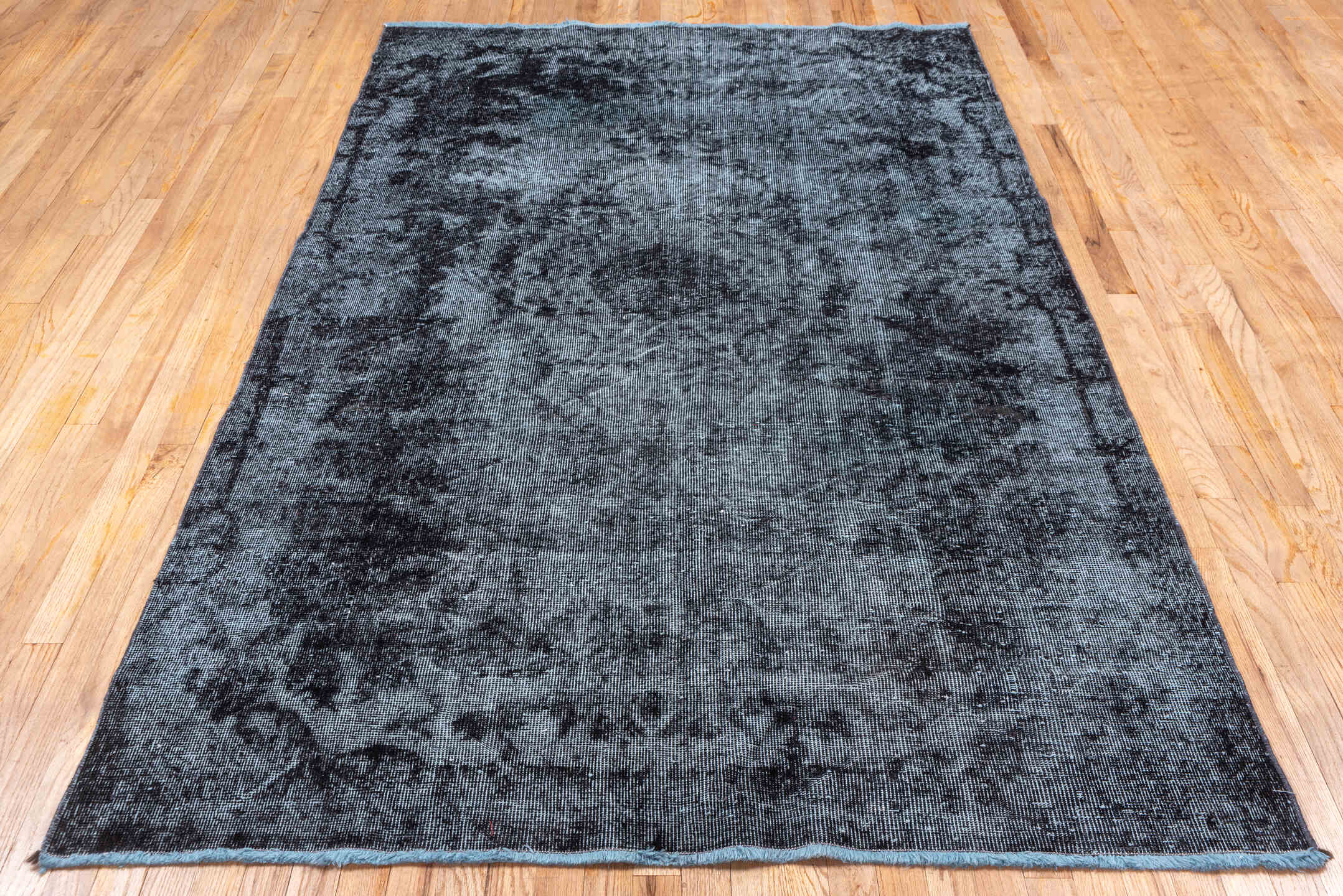 5' x 8' one-of-a-kind handmade vintage Sparta medium size rug. Color palette: black, blue, gray, light blue