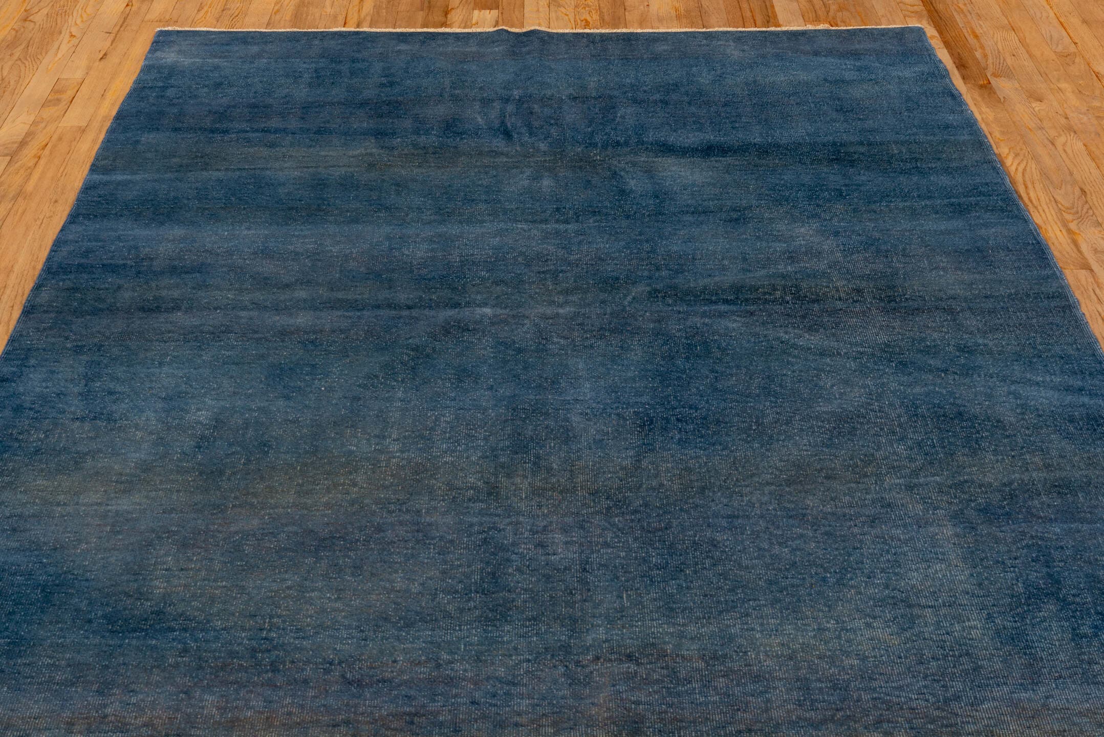 5' x 7' one-of-a-kind handmade antique Overdyed rug. Color palette: indigo, denim, slate, ivory, purple, blue, gray