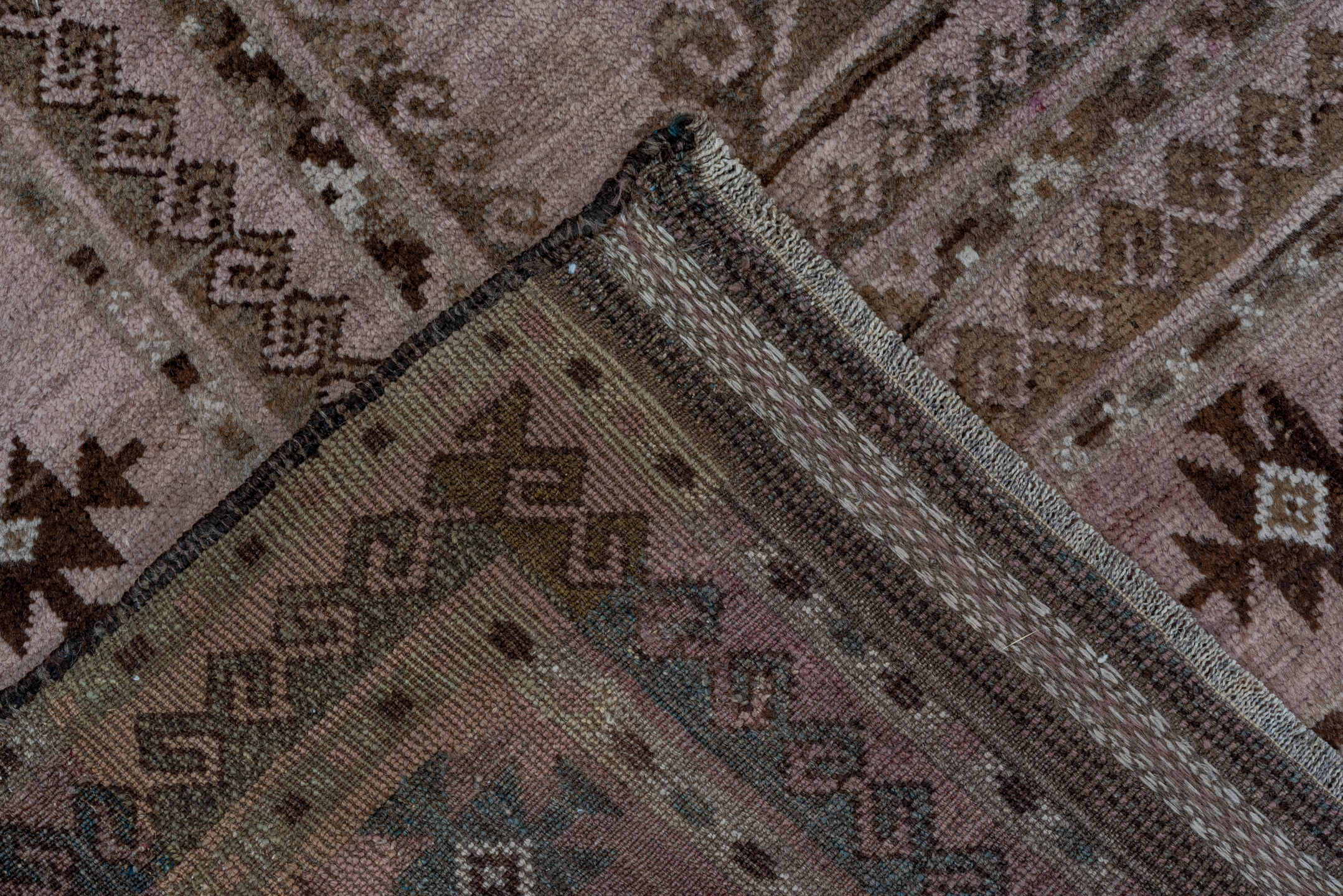5' x 8' one-of-a-kind handmade antique Belouch medium size rug. Color palette: taupe, brown, charcoal, rose, rust, ivory