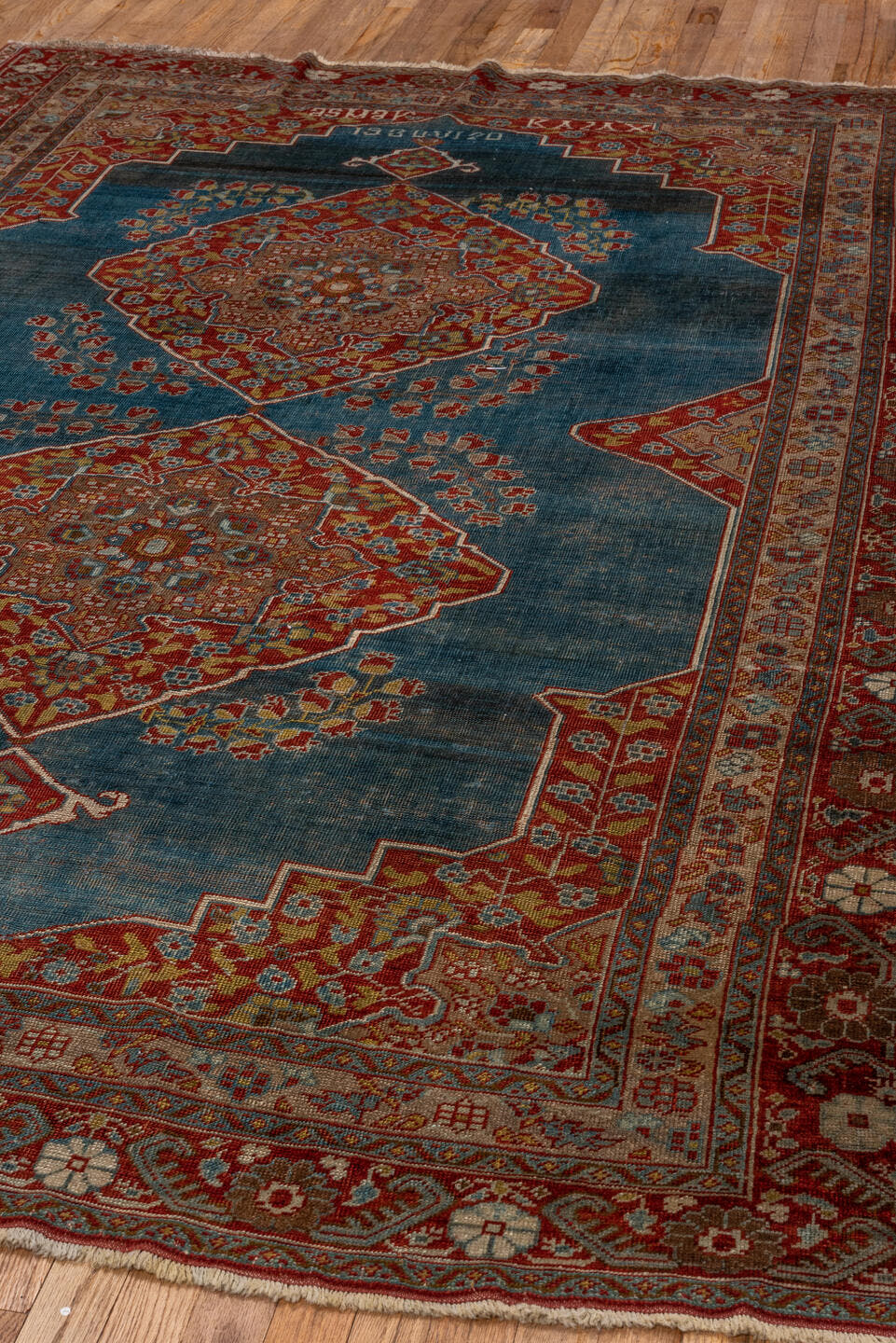 5' x 9' one-of-a-kind handmade antique Karabagh medium size rug. Color palette: turquoise, rust, ivory, terra cotta, gold