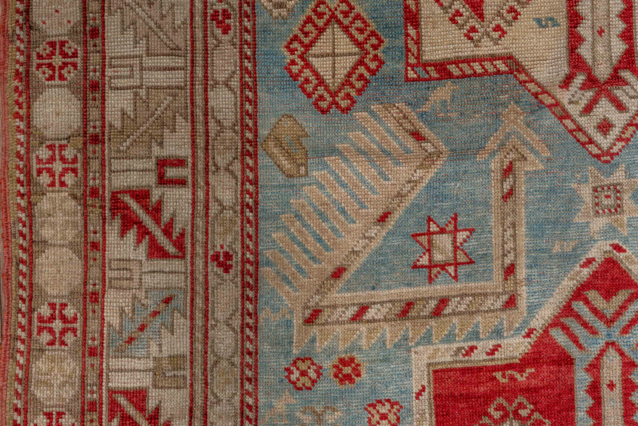 3' x 7' one-of-a-kind handmade antique Caucasian runner rug. Color palette: ivory, sky blue, rust, beige, camel, crimson