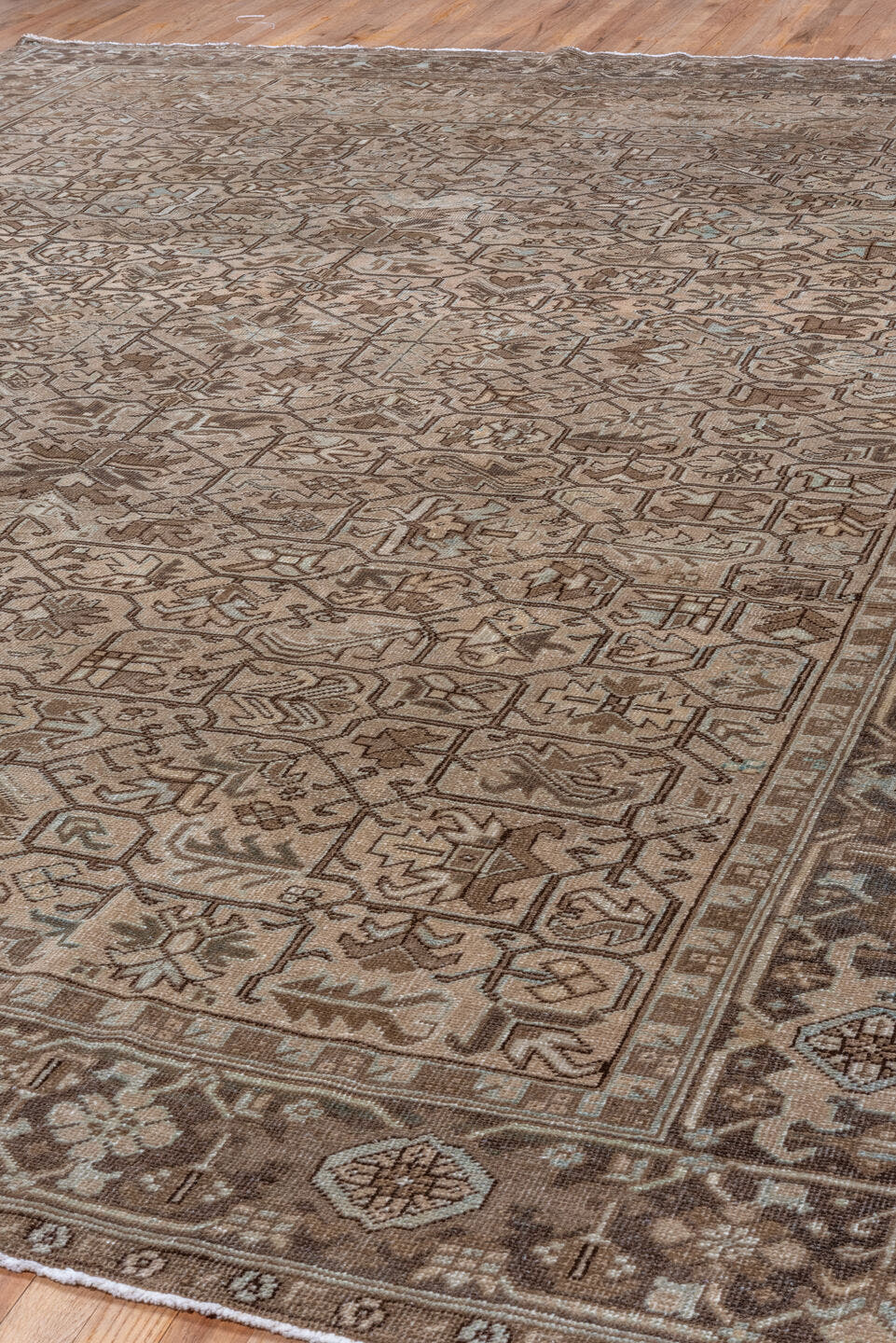9' x 12' one-of-a-kind handmade antique Heriz large size rug. Color palette: taupe, brown, camel, ivory, pale_blue, beige