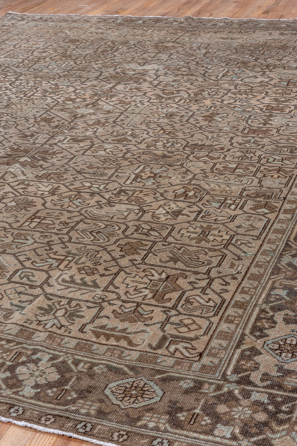 9' x 12' one-of-a-kind handmade antique Heriz large size rug. Color palette: taupe, brown, camel, ivory, pale_blue, beige
